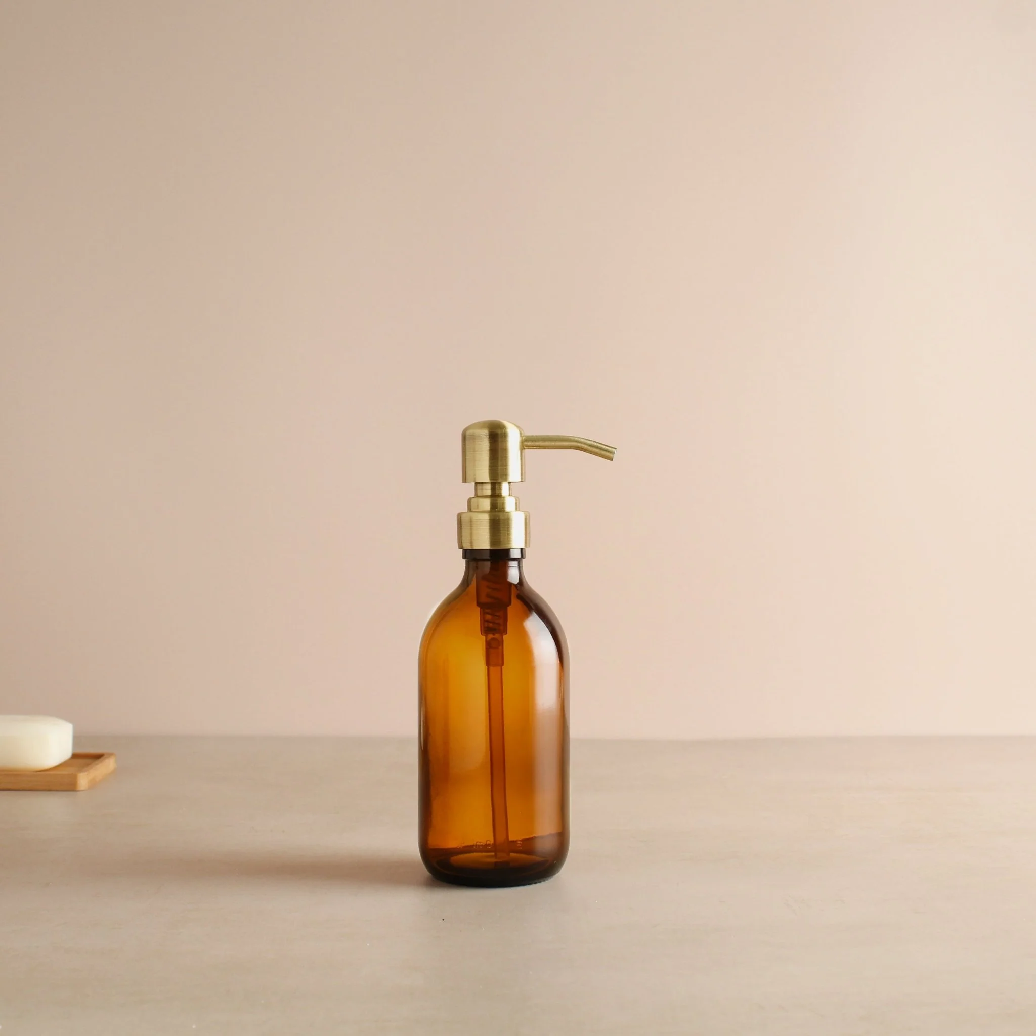 Amber Glass Dispenser Bottle With Gold Pump - Image 8