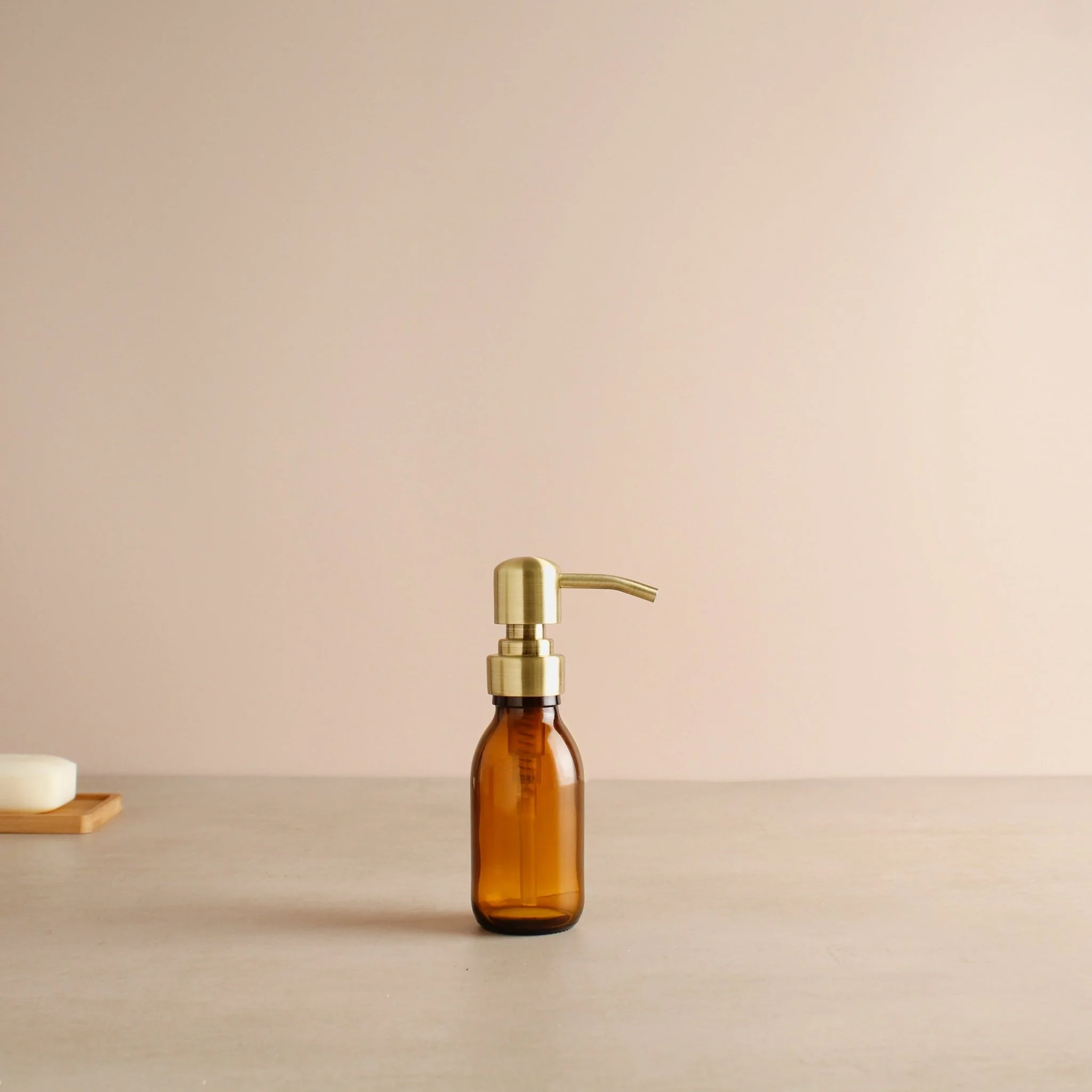 Amber Glass Dispenser Bottle With Gold Pump - Image 9
