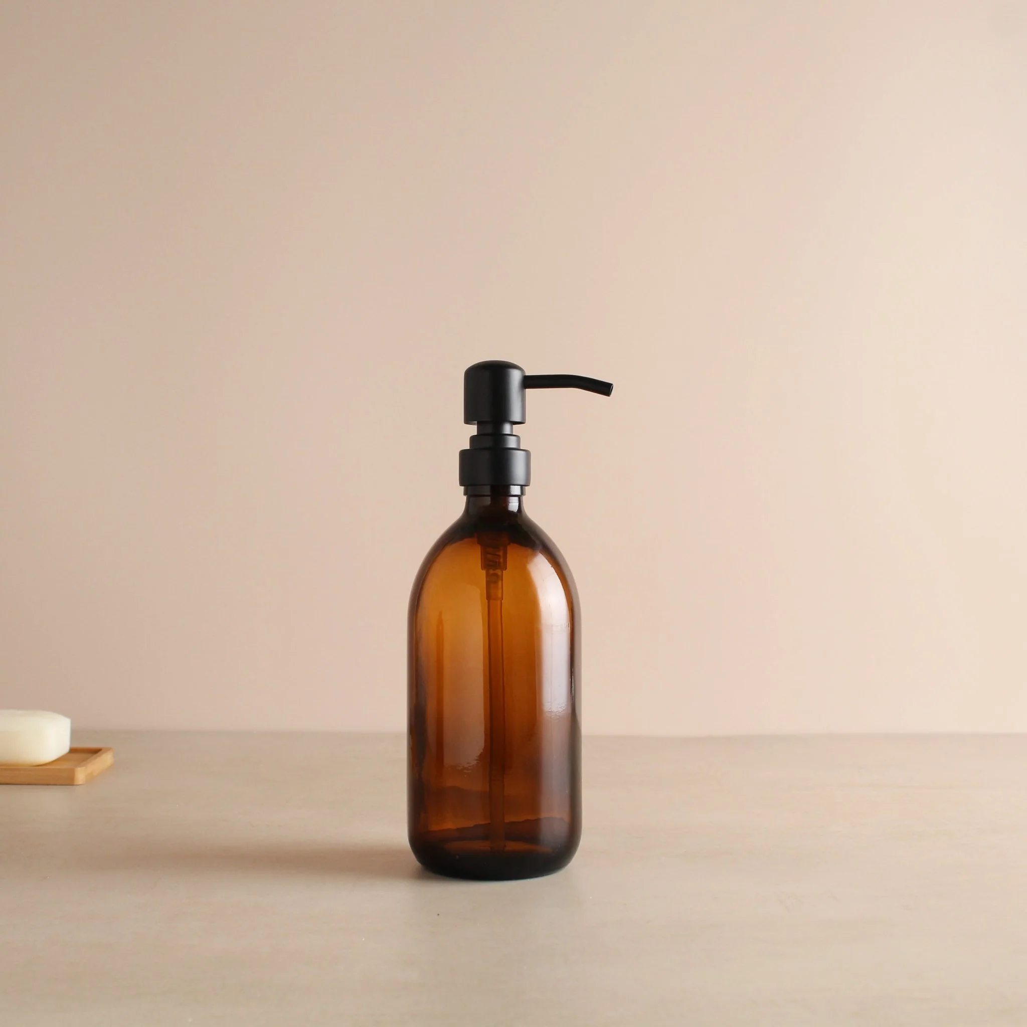 Amber Glass Dispenser Bottle With Matte Black Pump - Image 4