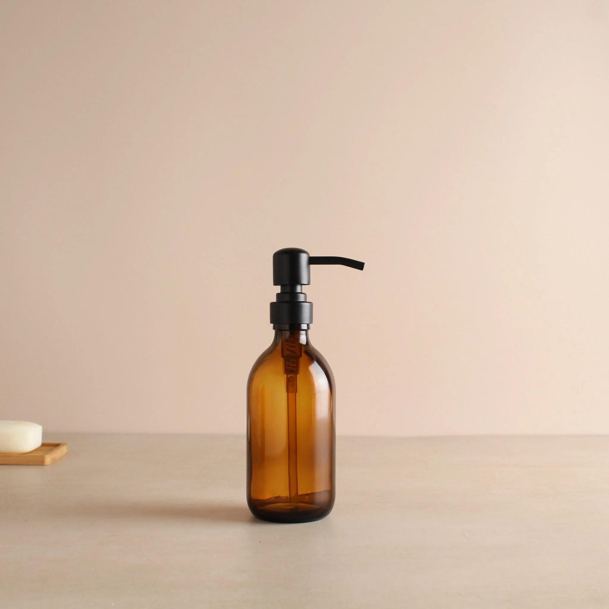 Amber Glass Dispenser Bottle With Matte Black Pump - Image 5