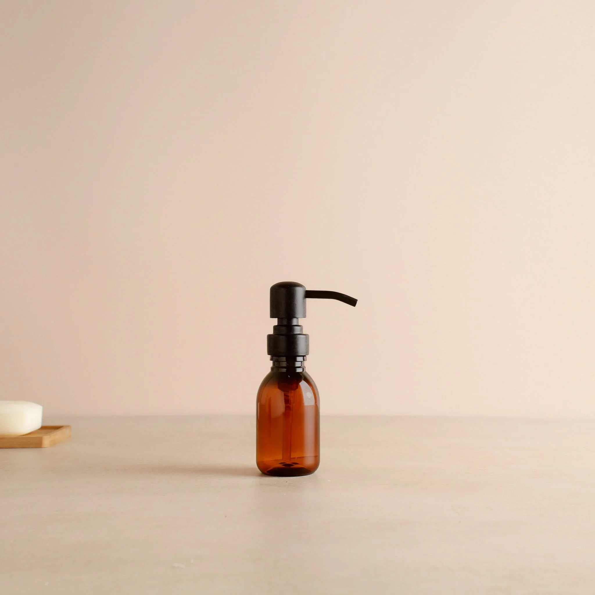 Amber Plastic Dispenser Bottle With Matte Black Pump - Image 6