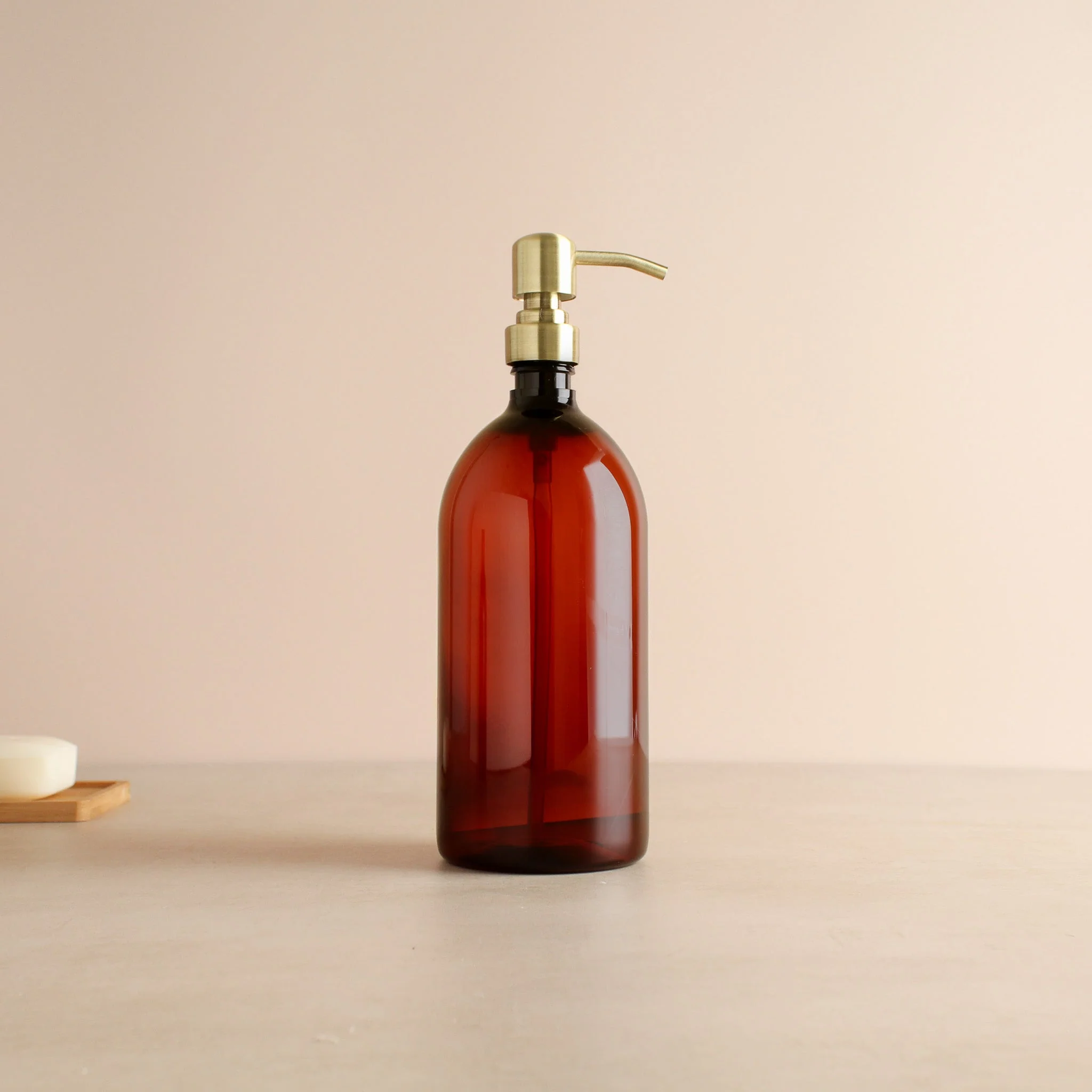 Amber Plastic Dispenser Bottle With Metal Gold Pump - Image 3