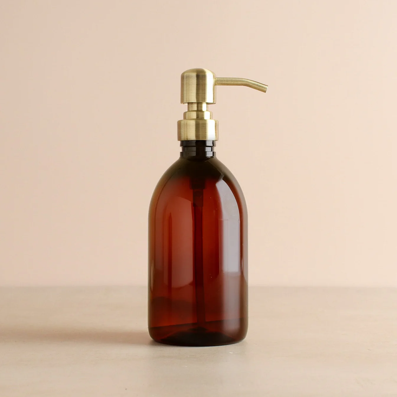 Amber Plastic Dispenser Bottle With Metal Gold Pump - Image 4