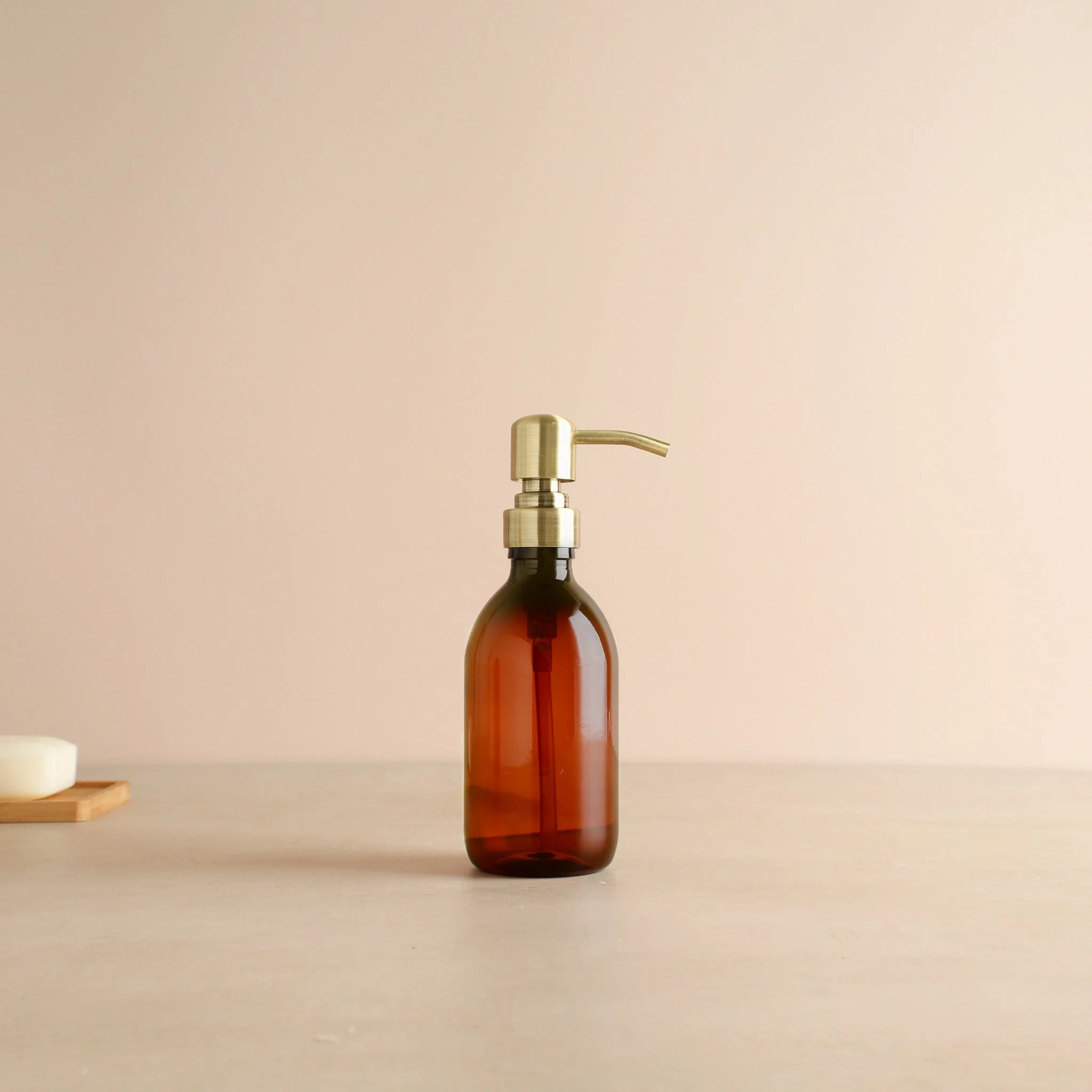 Amber Plastic Dispenser Bottle With Metal Gold Pump - Image 5