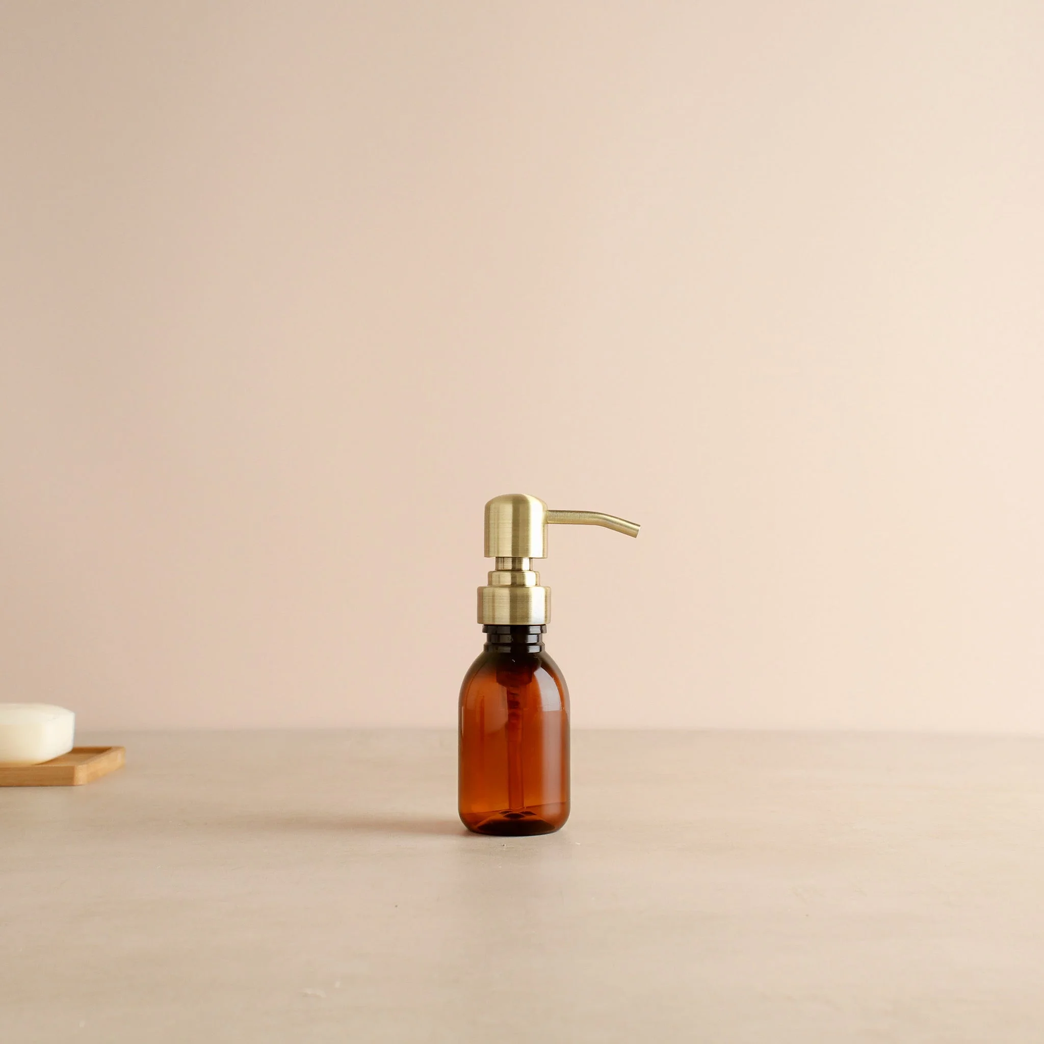 Amber Plastic Dispenser Bottle With Metal Gold Pump - Image 6