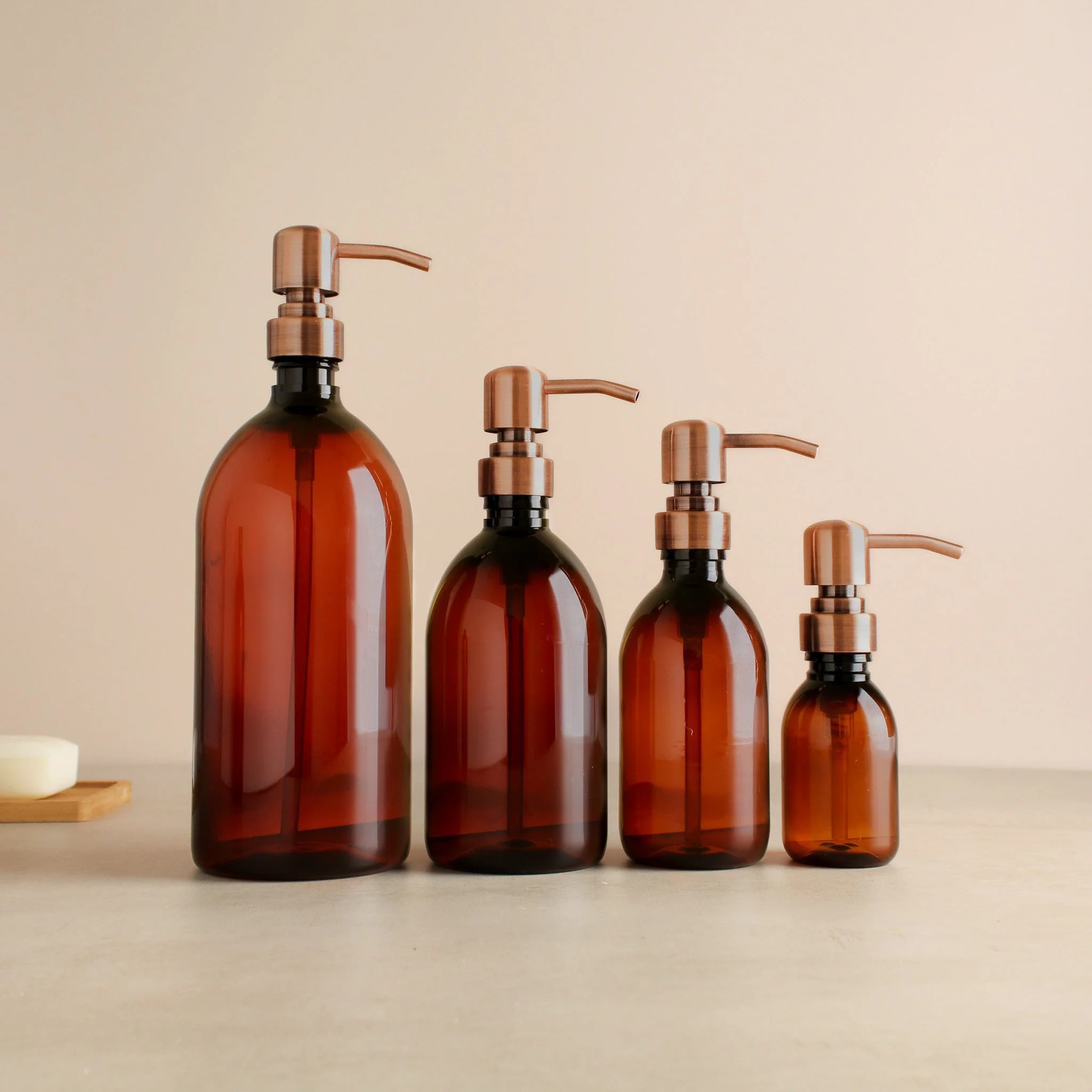 Amber Plastic Dispenser Bottle With Rose Gold Pump - Image 2