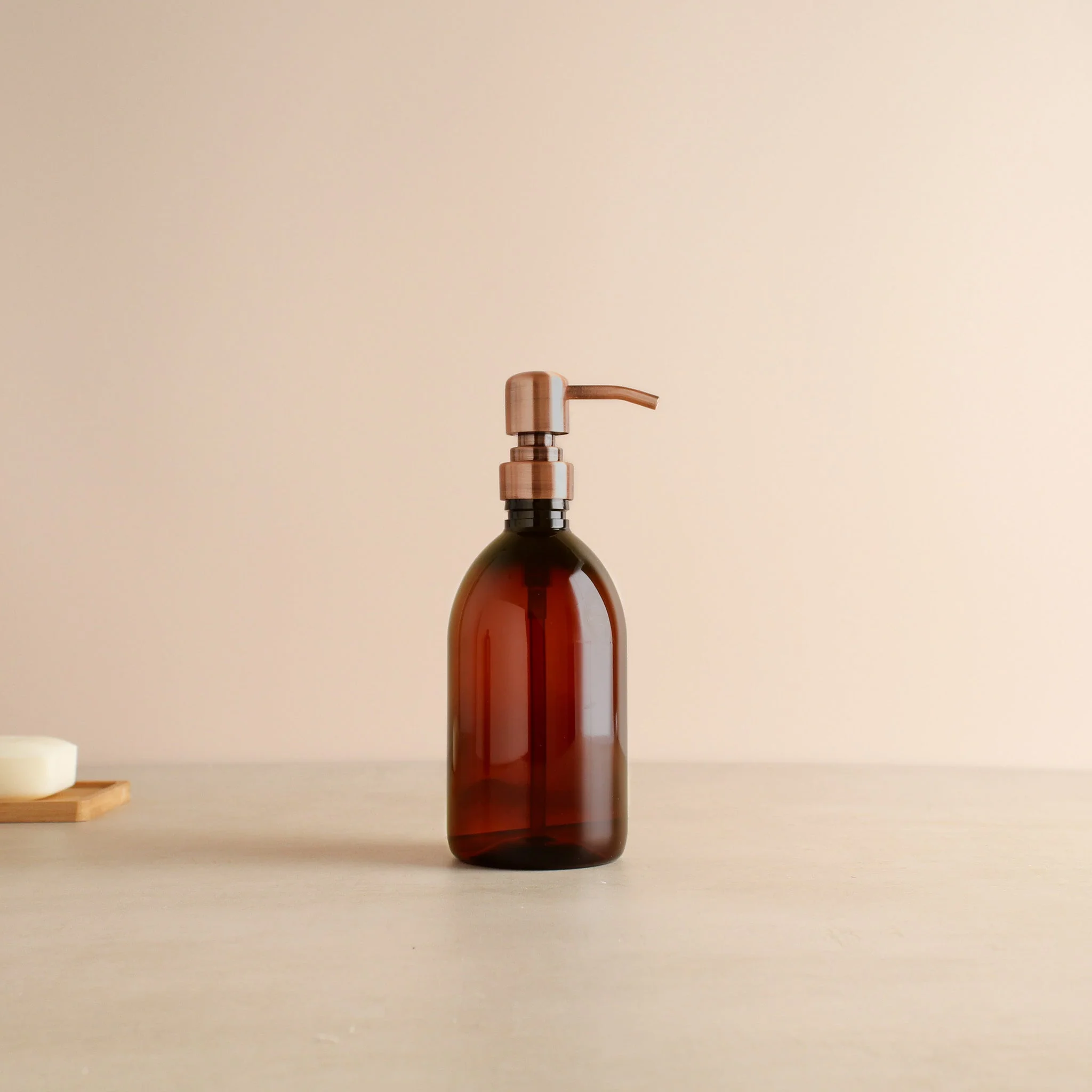 Amber Plastic Dispenser Bottle With Rose Gold Pump - Image 4
