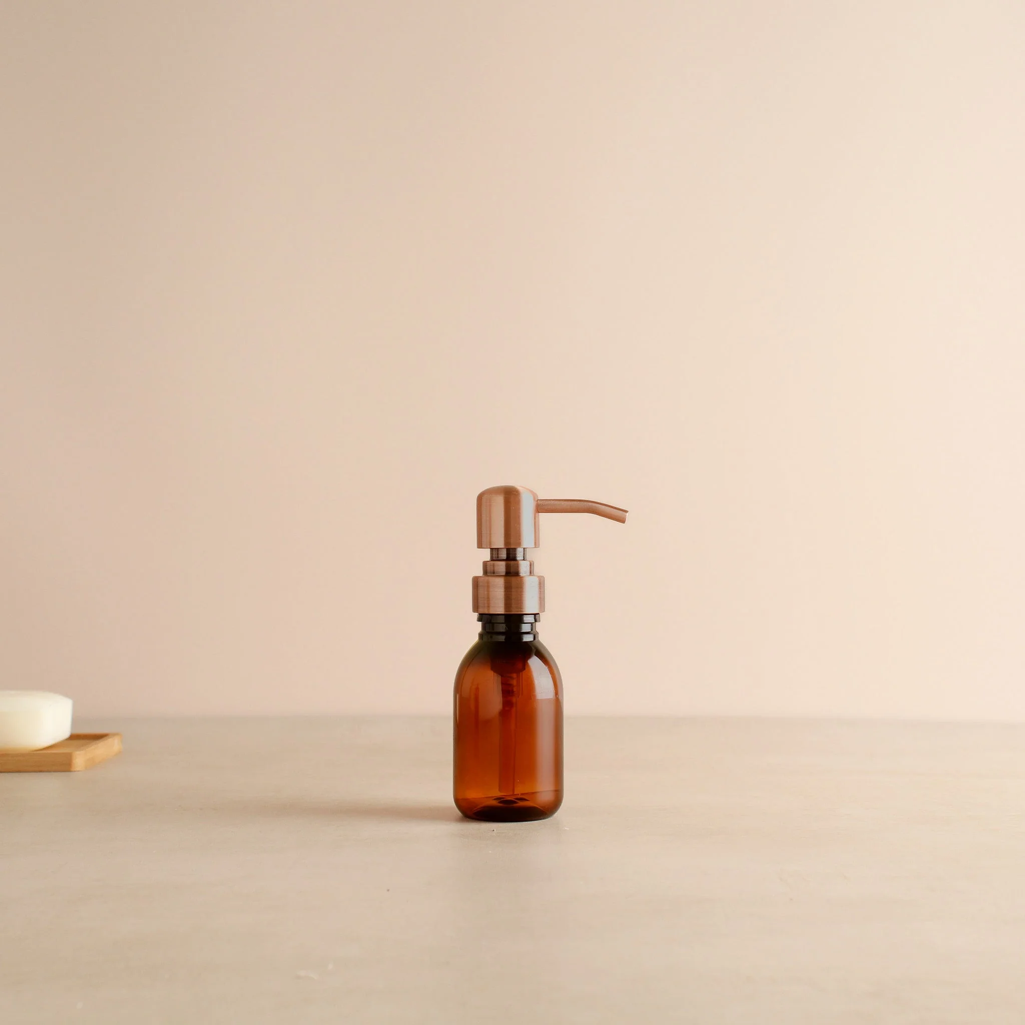 Amber Plastic Dispenser Bottle With Rose Gold Pump - Image 6