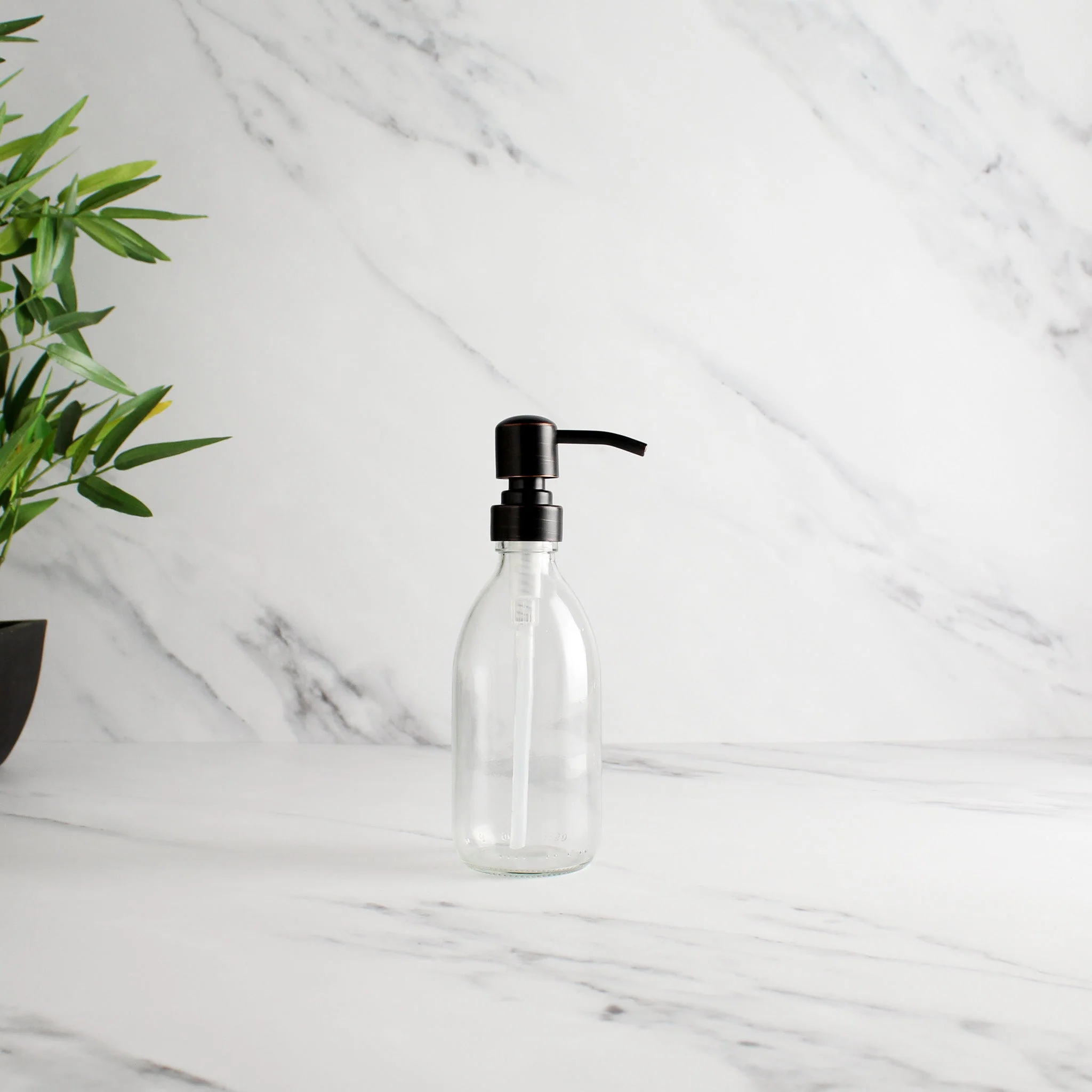 Clear Glass Dispenser Bottle With Black/Copper Pump - Image 5