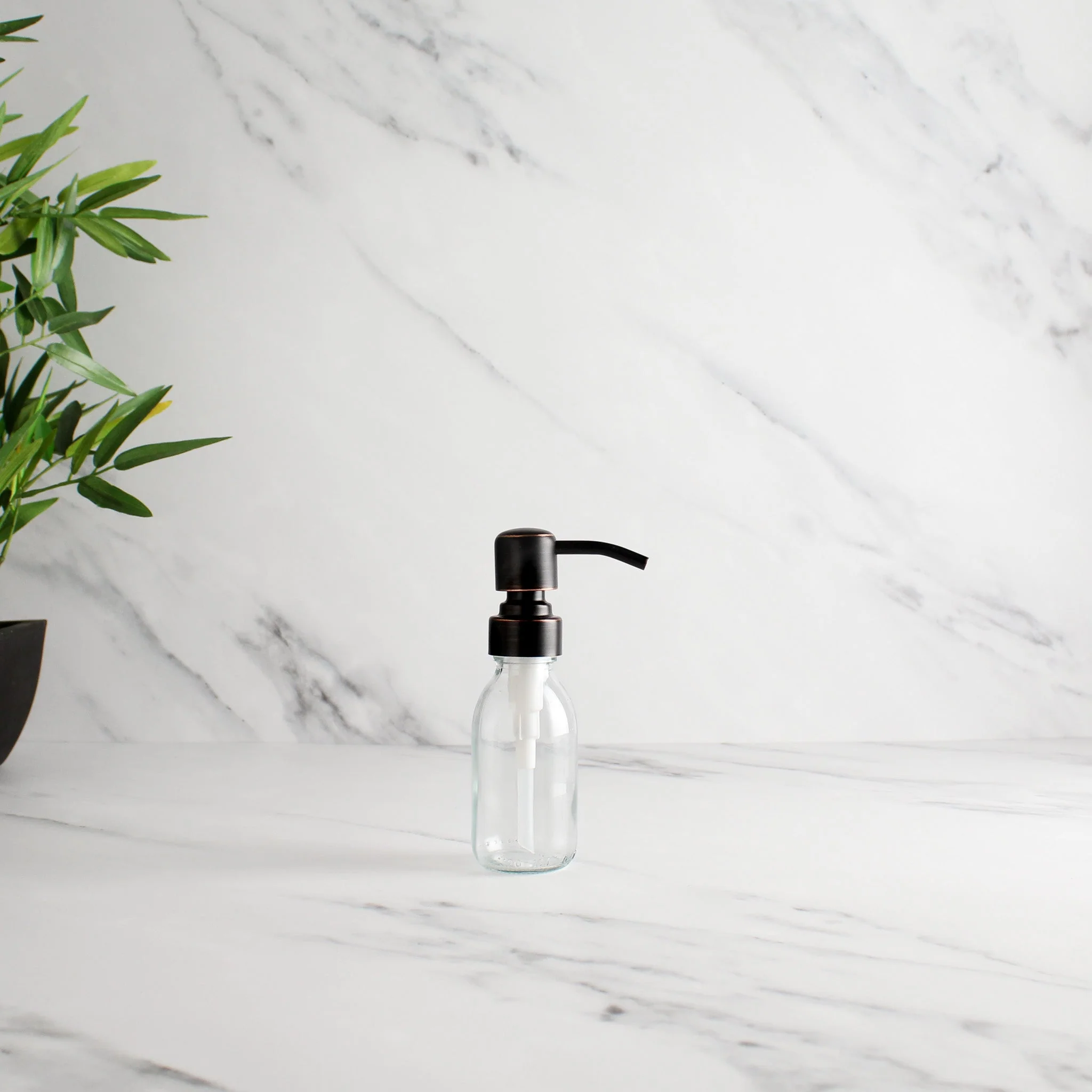Clear Glass Dispenser Bottle With Black/Copper Pump - Image 6