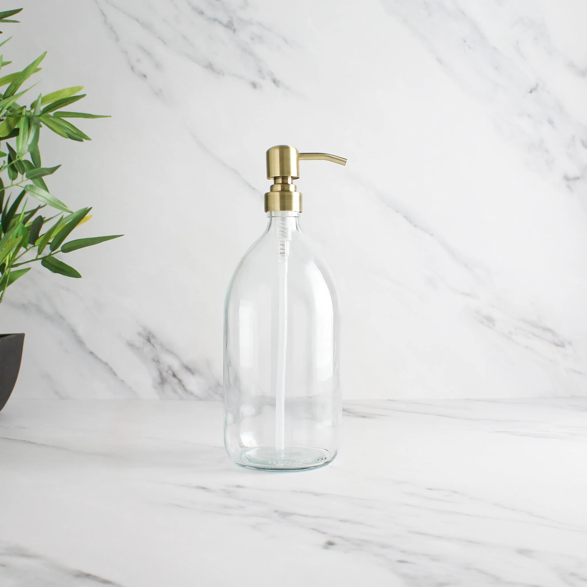 Clear Glass Dispenser Bottle With Gold Pump - Image 3