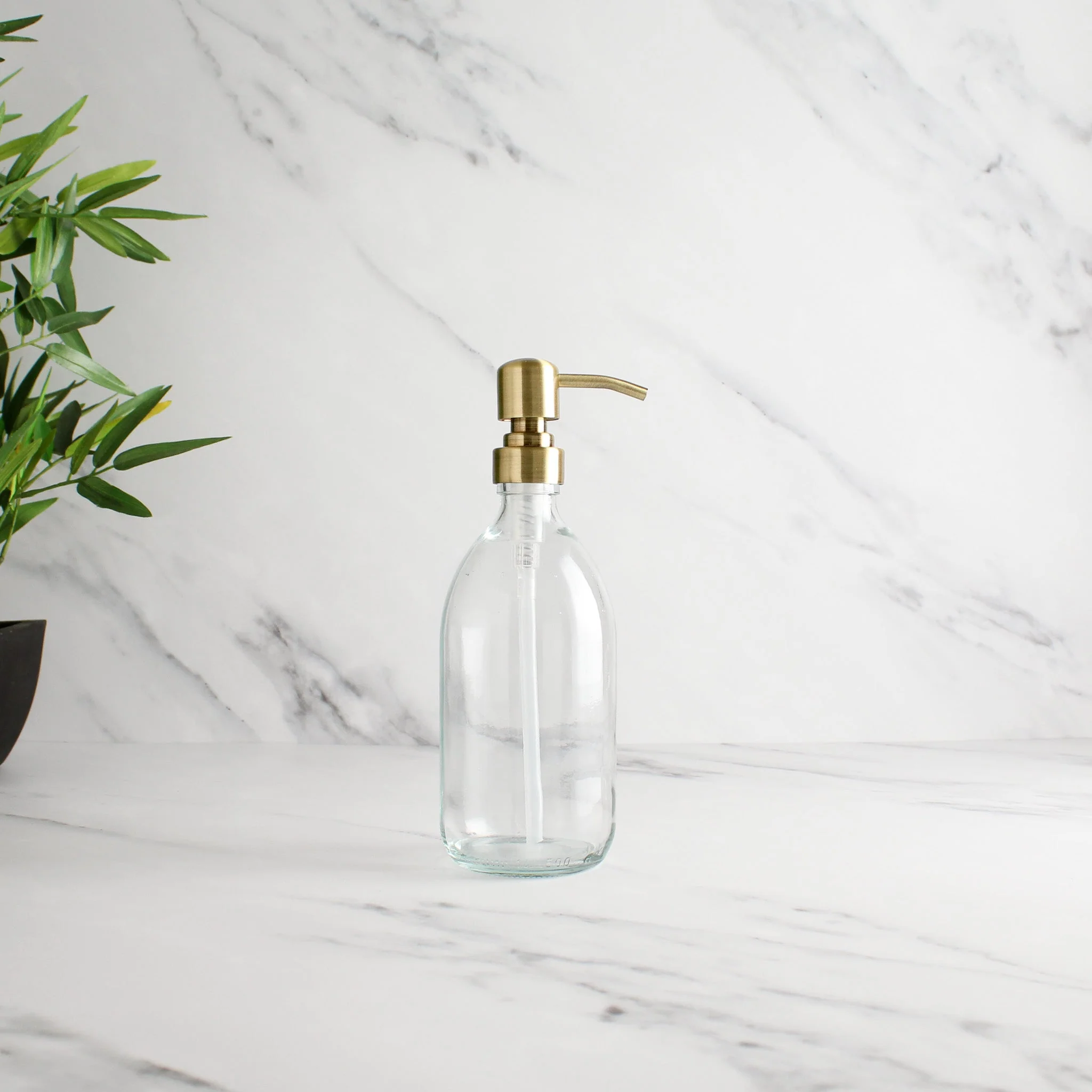 Clear Glass Dispenser Bottle With Gold Pump - Image 4