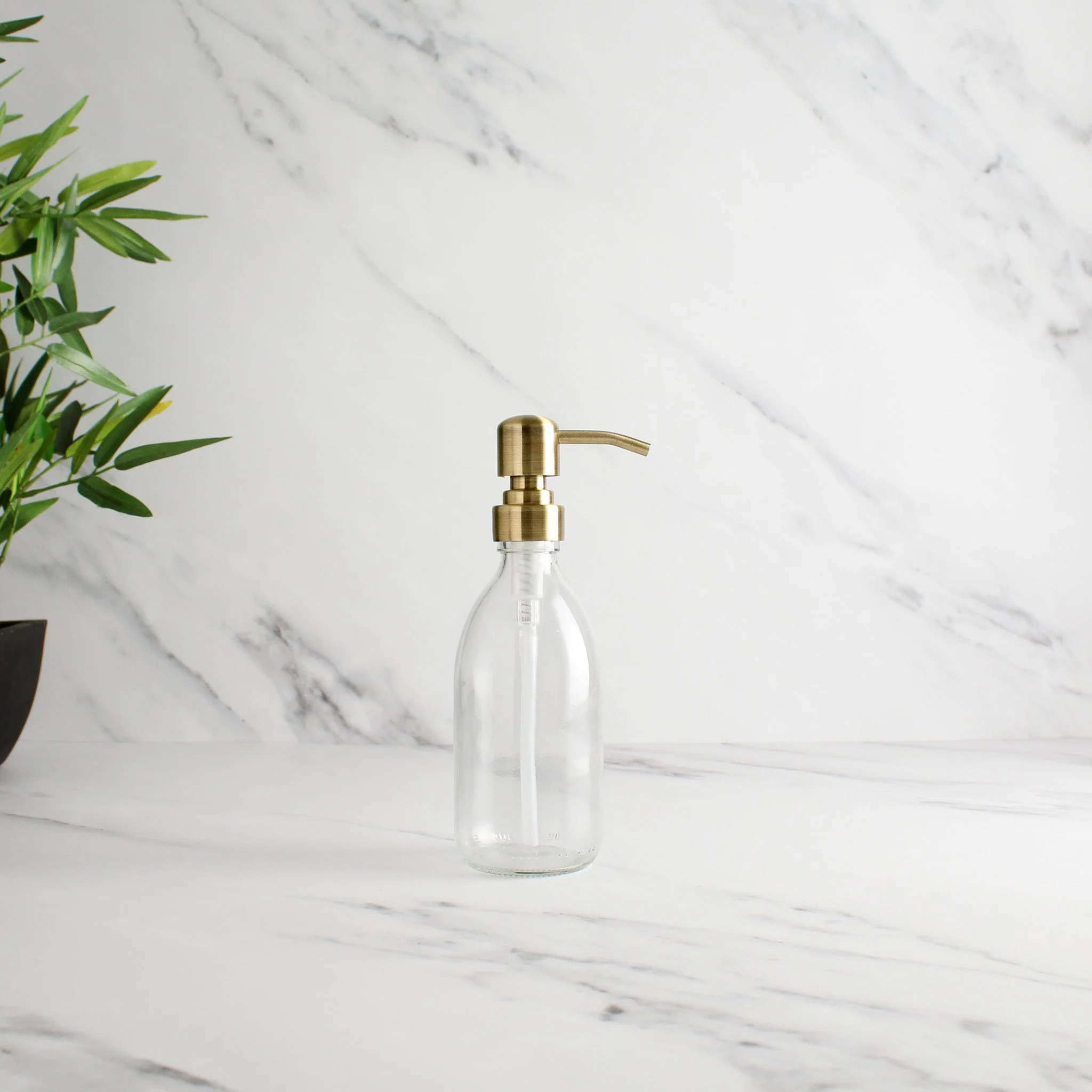 Clear Glass Dispenser Bottle With Gold Pump - Image 5