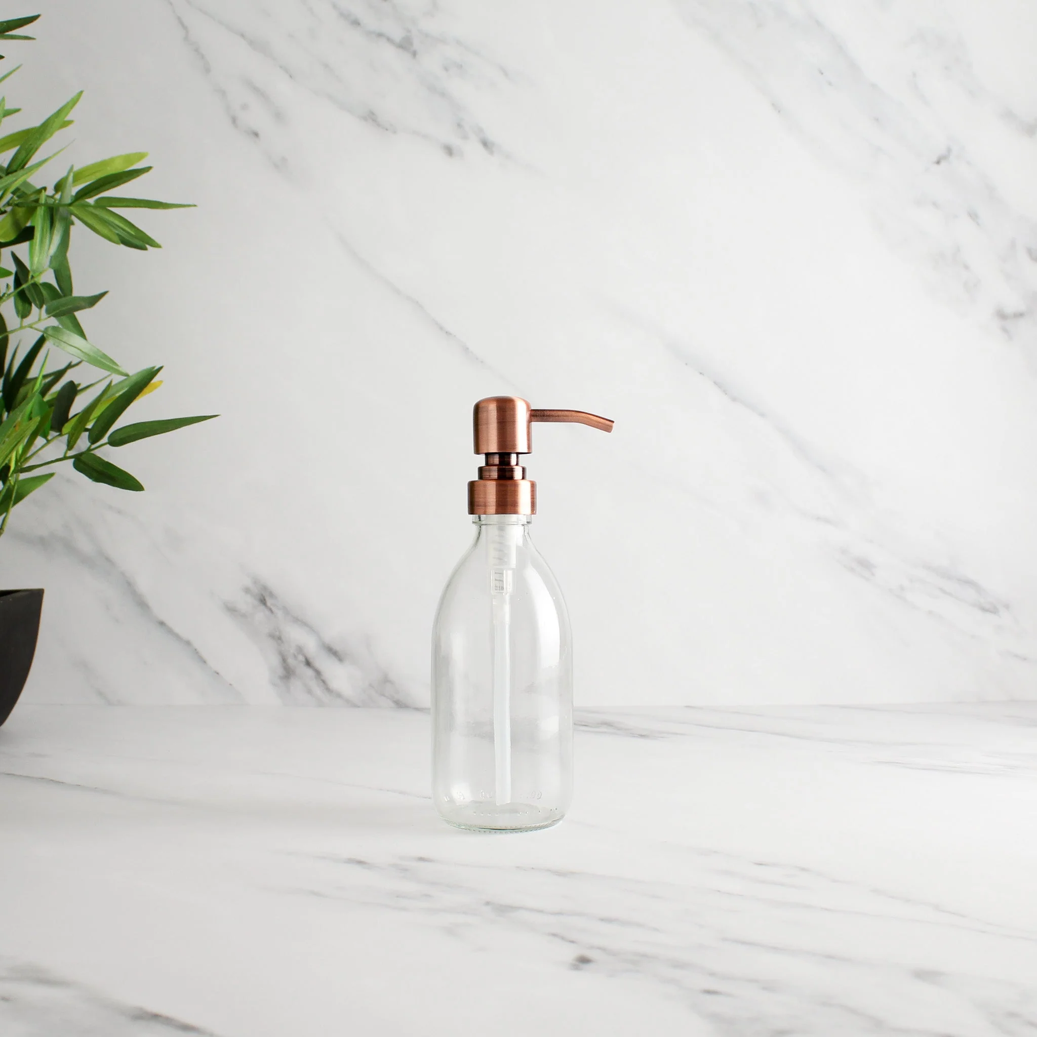 Clear Glass Dispenser Bottle With Rose Gold Pump - Image 5
