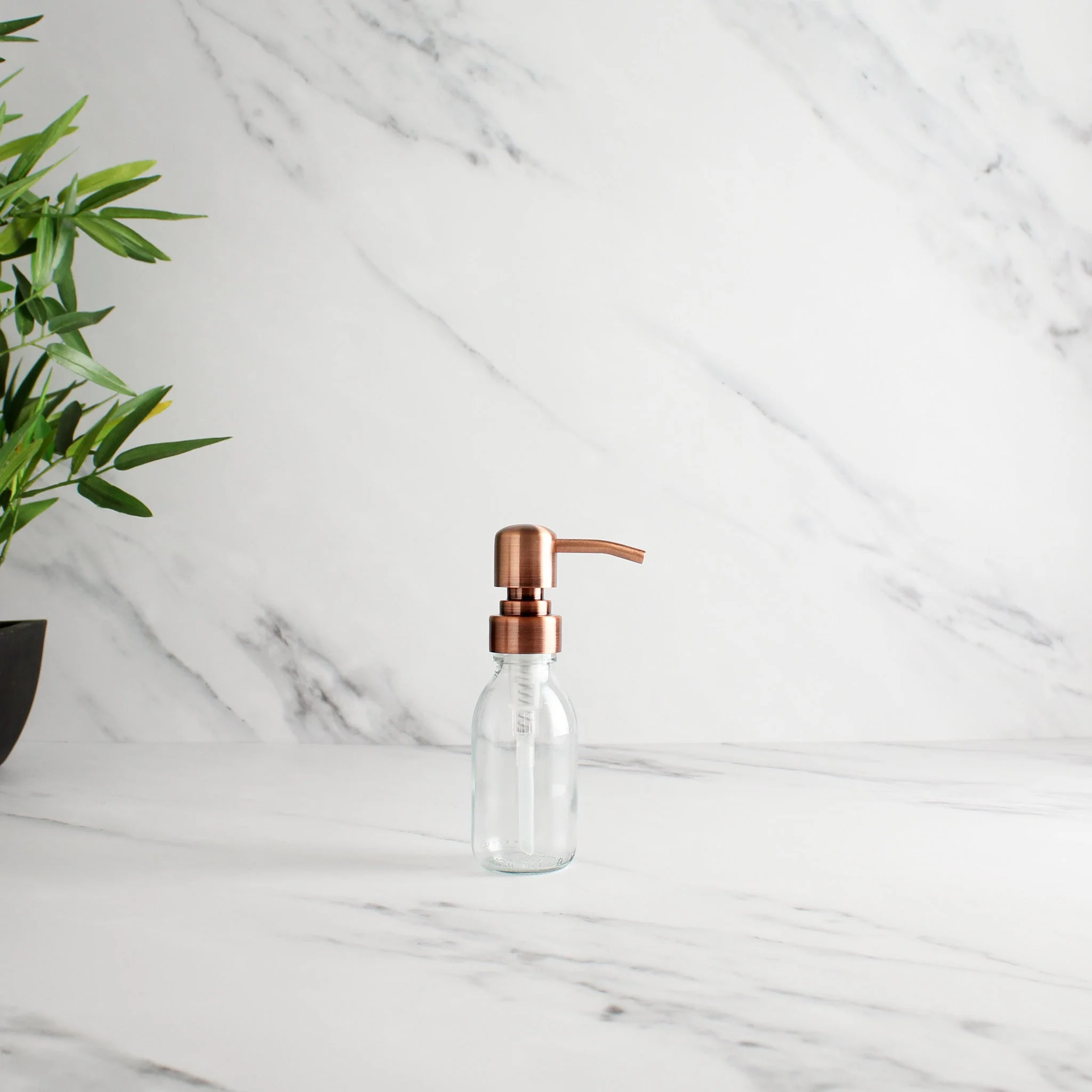 Clear Glass Dispenser Bottle With Rose Gold Pump - Image 6
