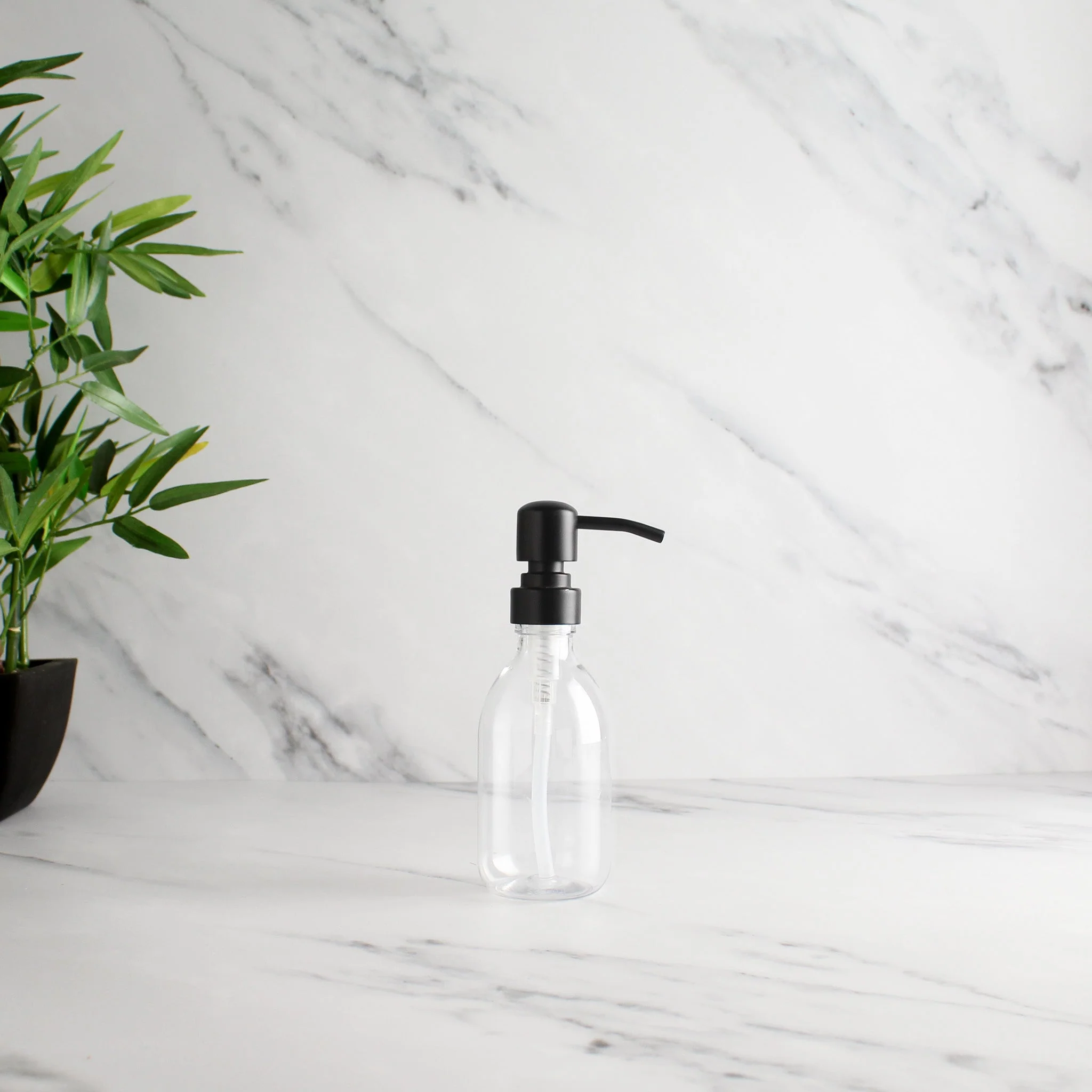 Clear Plastic Dispenser Bottle With Matte Black Pump - Image 5