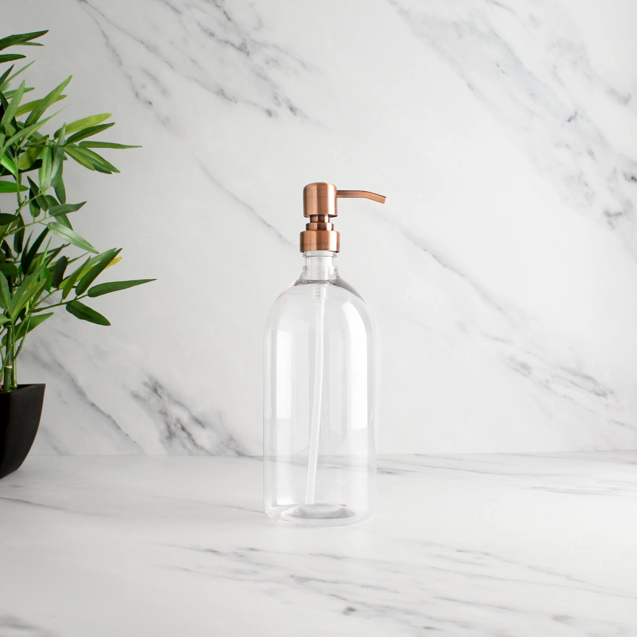 Clear Plastic Dispenser Bottle With Rose Gold Pump - Image 3