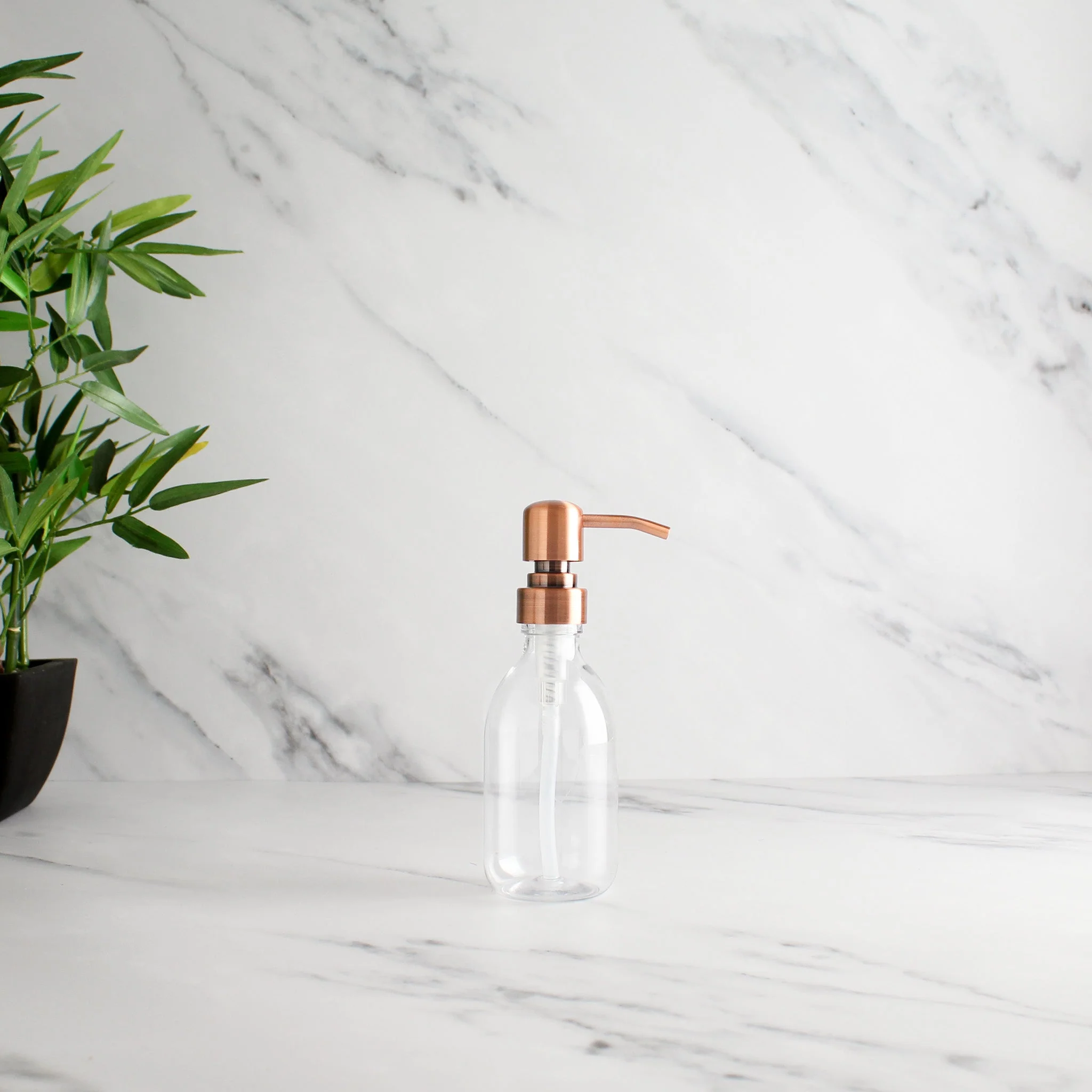 Clear Plastic Dispenser Bottle With Rose Gold Pump - Image 5