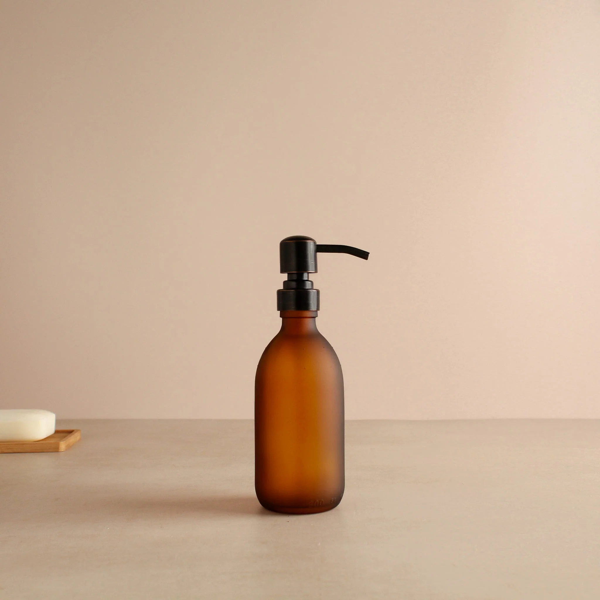 Frosted Amber Glass Dispenser Bottle With Black/Copper Pump - Image 5