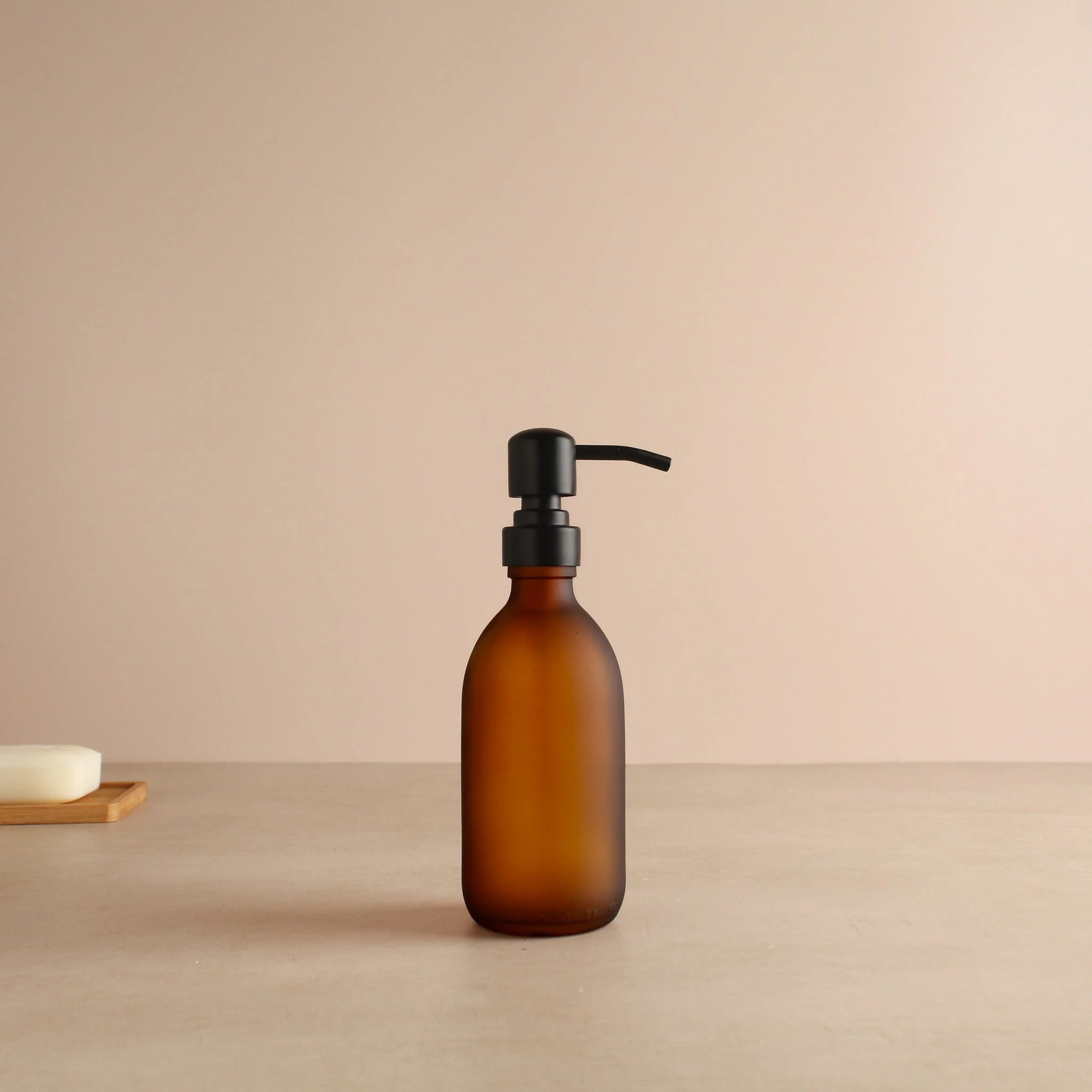 Frosted Amber Glass Dispenser Bottle With Matte Black Pump - Image 5