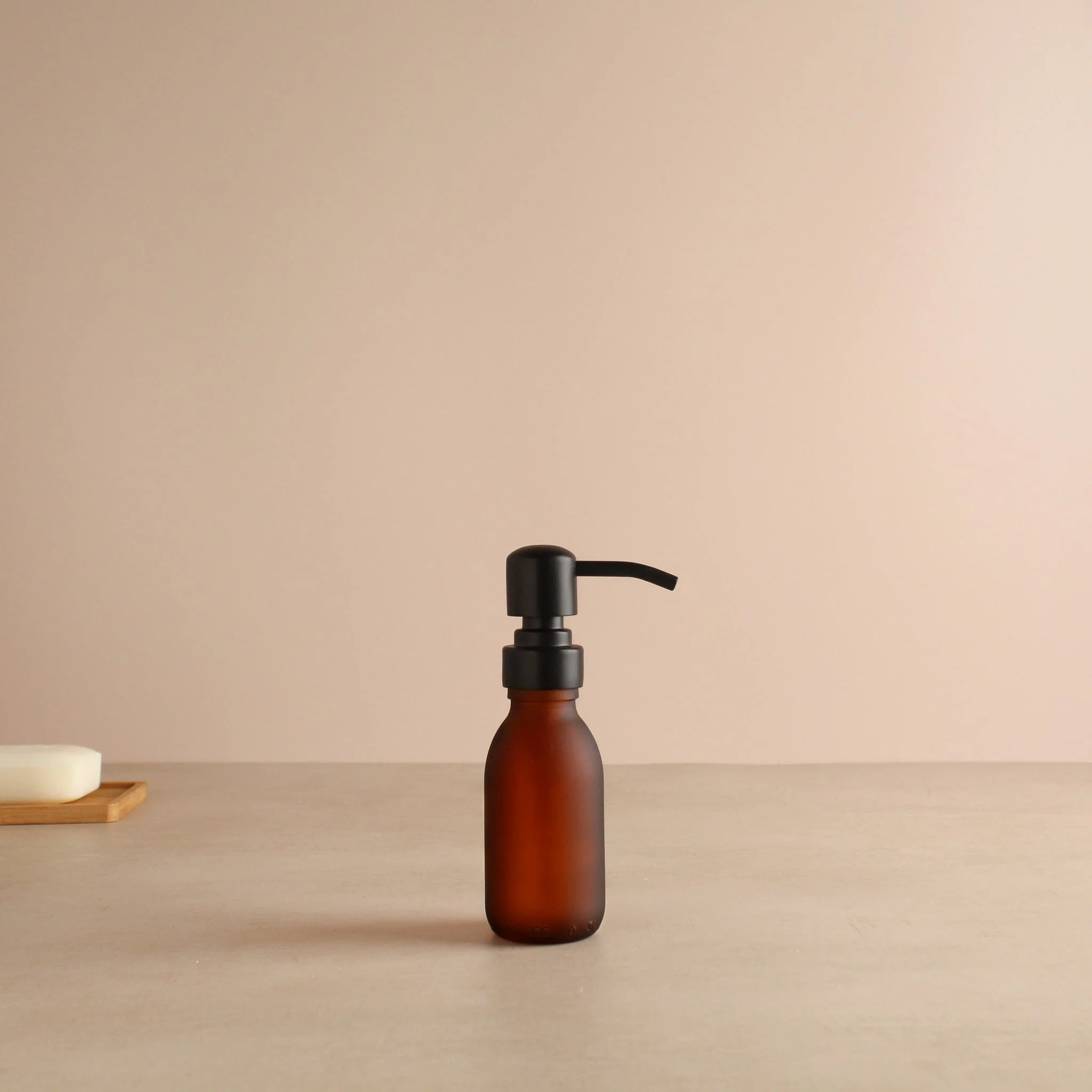 Frosted Amber Glass Dispenser Bottle With Matte Black Pump - Image 6