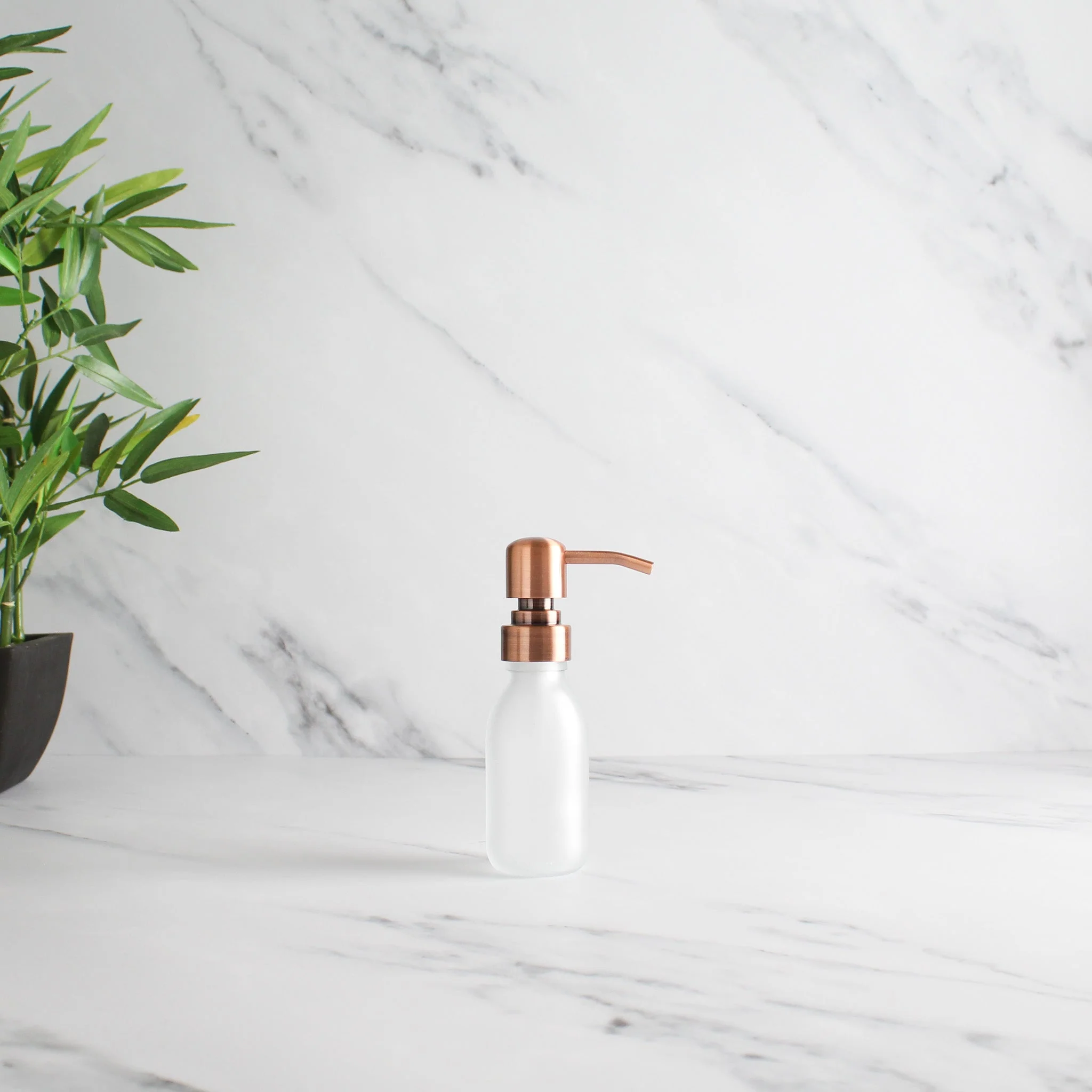 Frosted White Glass Dispenser Bottle With Rose Gold Pump - Image 6