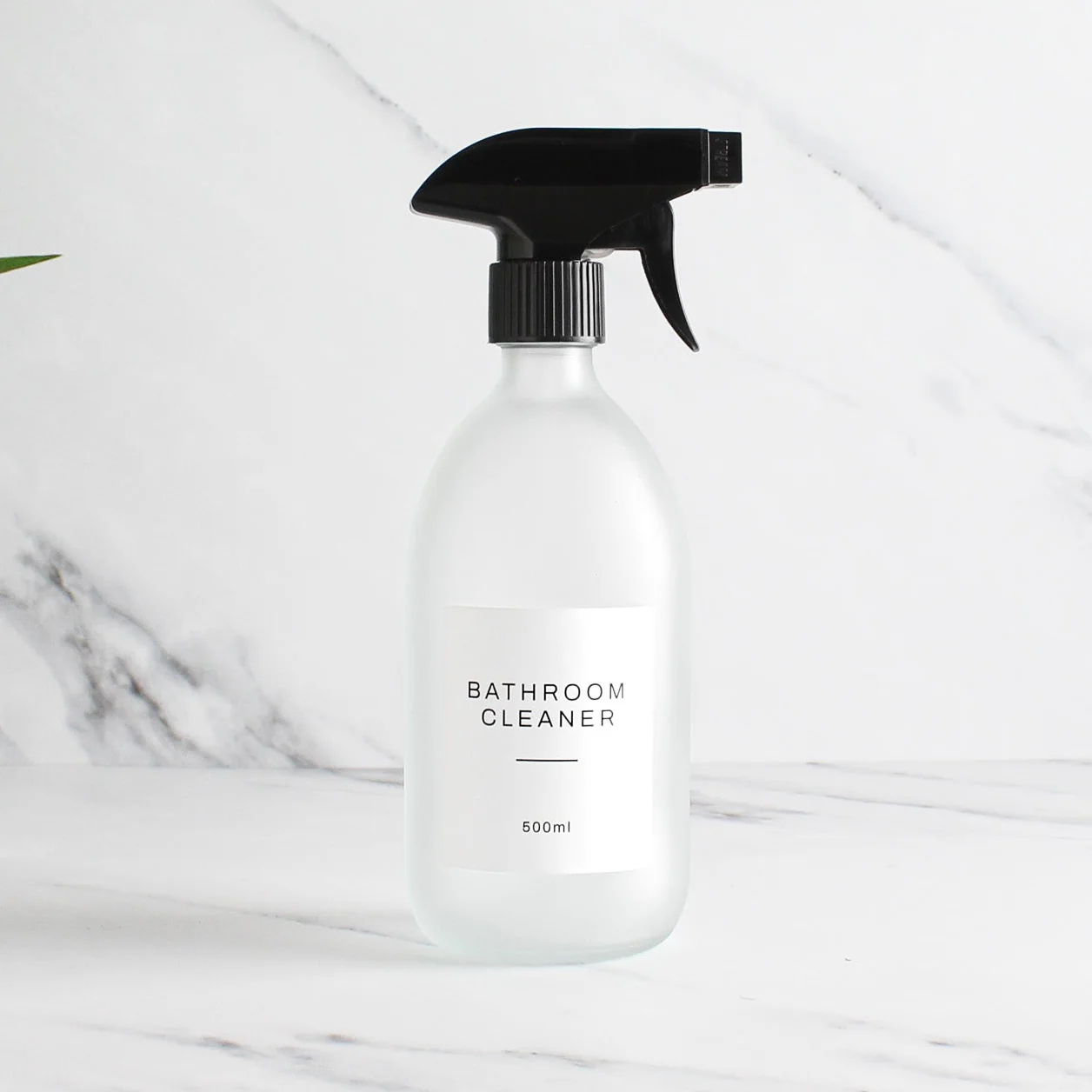 Frosted White Glass Spray Bottle With Label