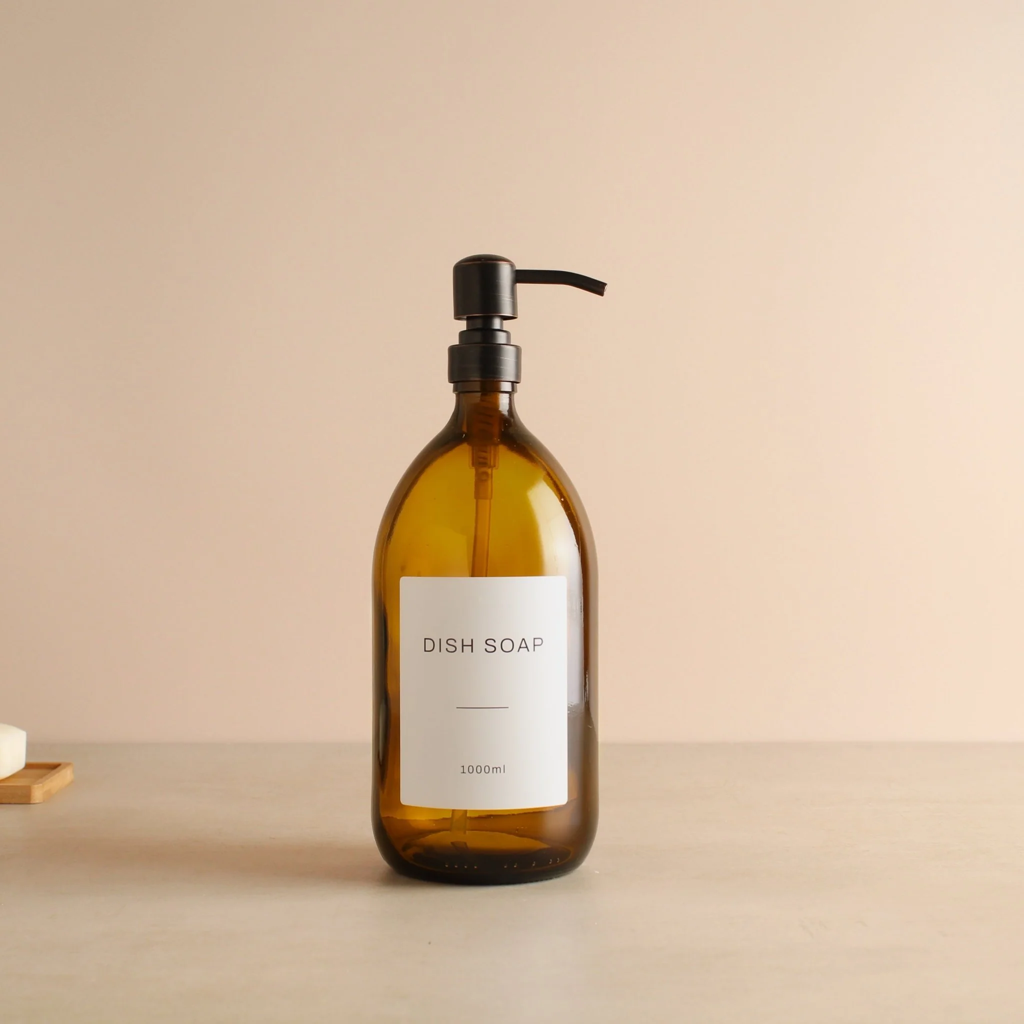 Labelled Amber Glass Dispenser Bottle With Black/Copper Pump - Image 3