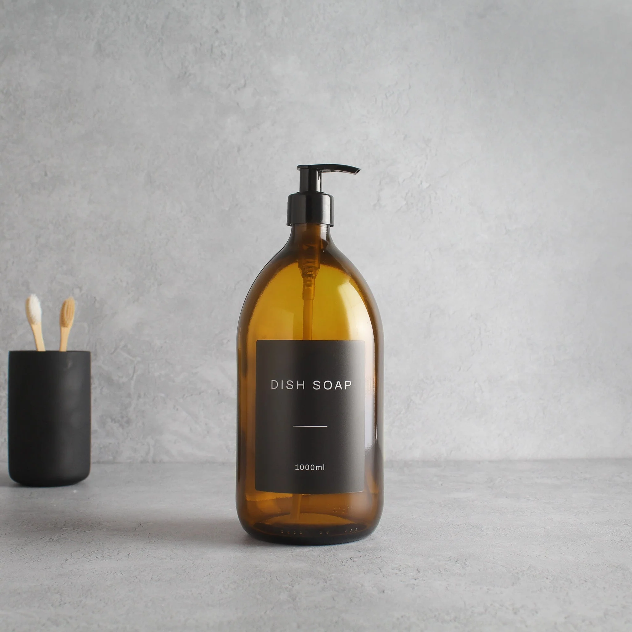 Labelled Amber Glass Dispenser Bottle With Black Pump - Image 3