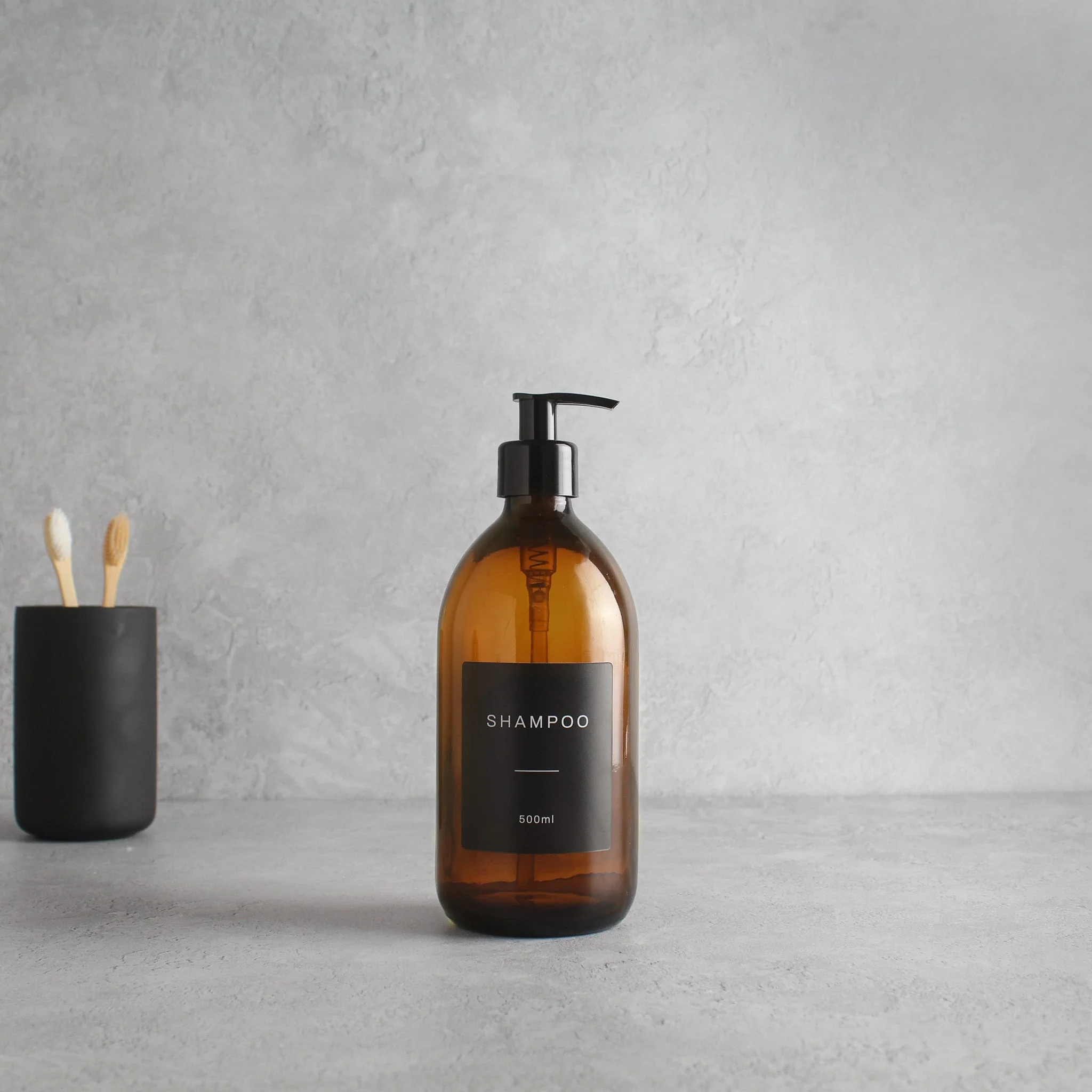 Labelled Amber Glass Dispenser Bottle With Black Pump - Image 4