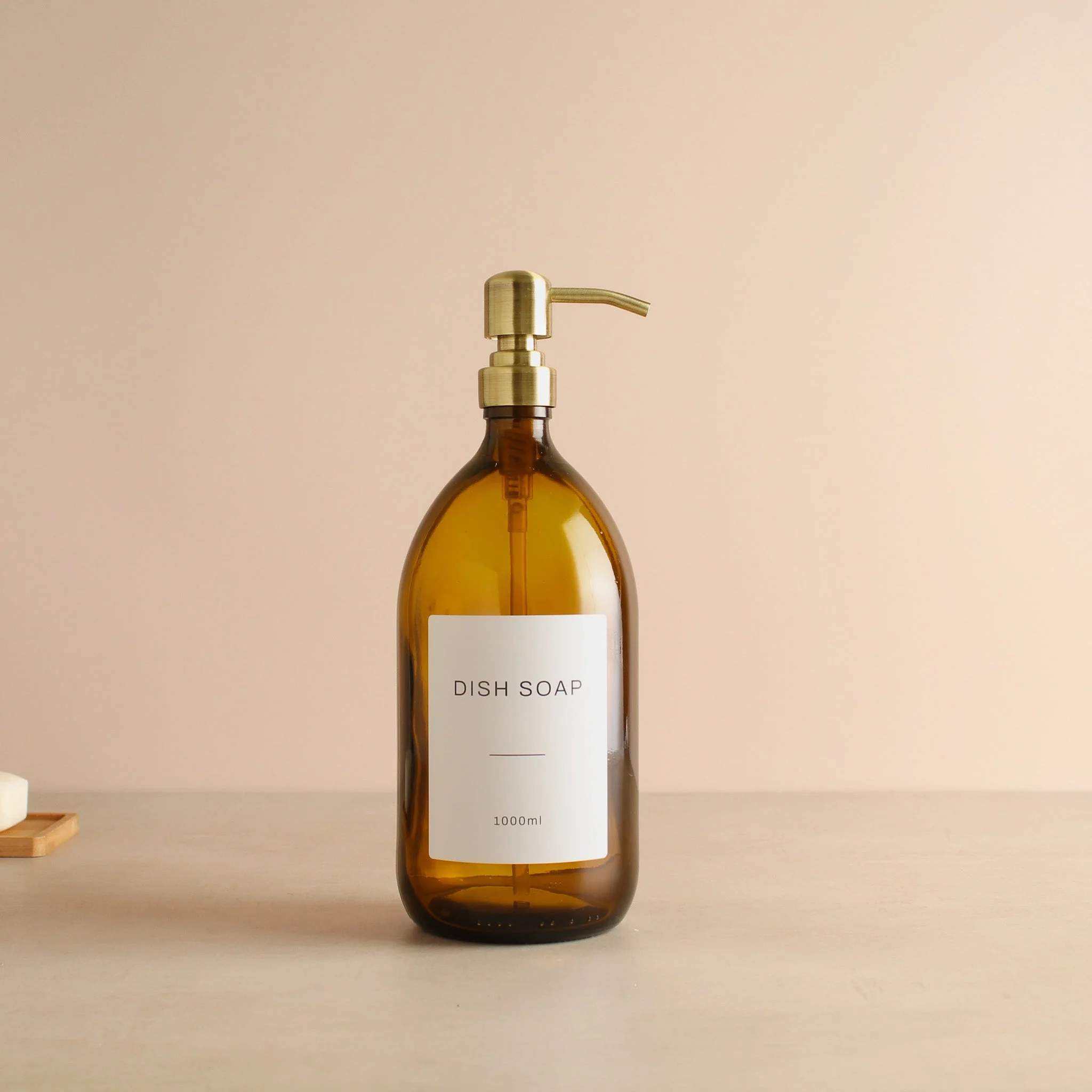 Labelled Amber Glass Dispenser Bottle With Gold Pump - Image 5
