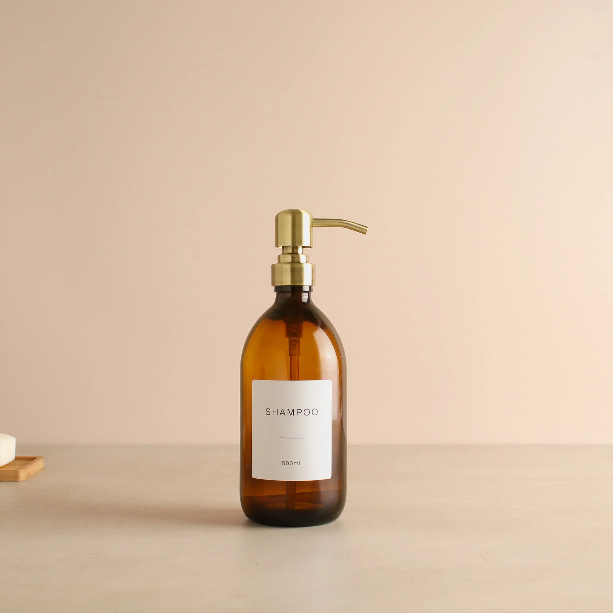 Labelled Amber Glass Dispenser Bottle With Gold Pump - Image 6