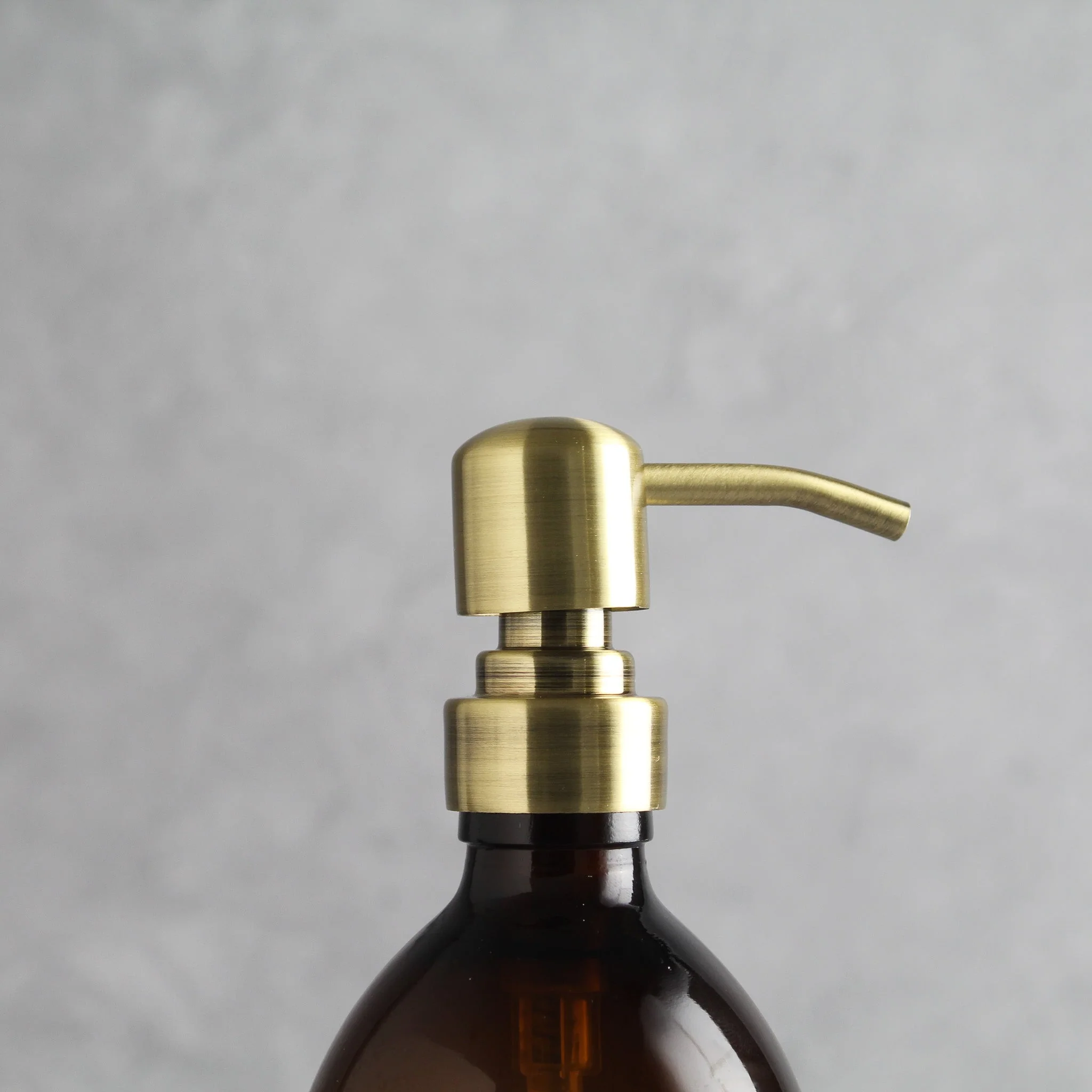 Labelled Amber Glass Dispenser Bottle With Gold Pump - Image 6
