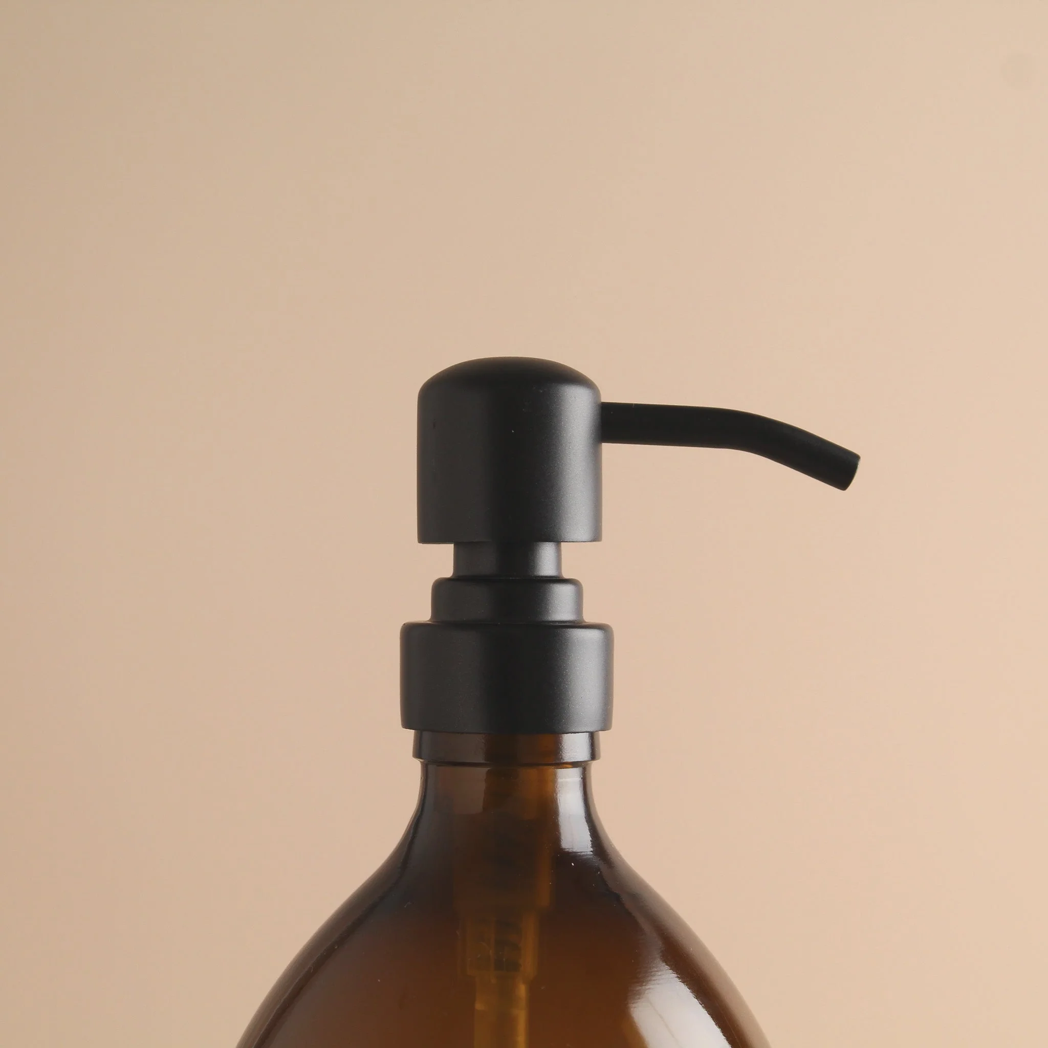 Labelled Amber Glass Dispenser Bottle With Matte Black Pump - Image 6