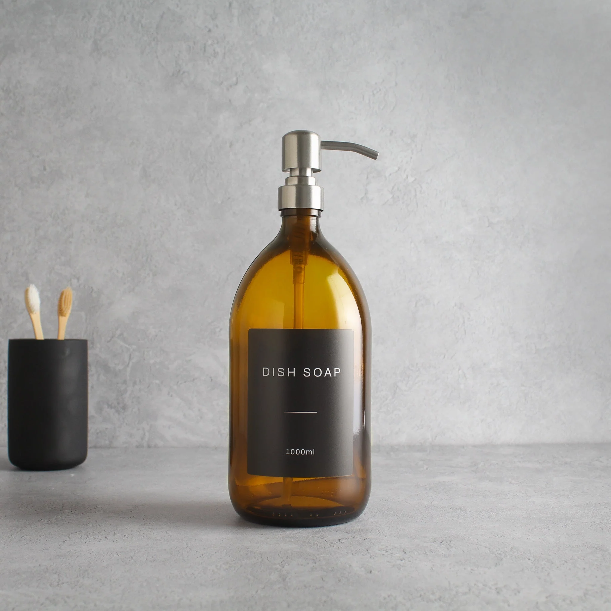 Labelled Amber Glass Dispenser Bottle With Silver Pump - Image 3