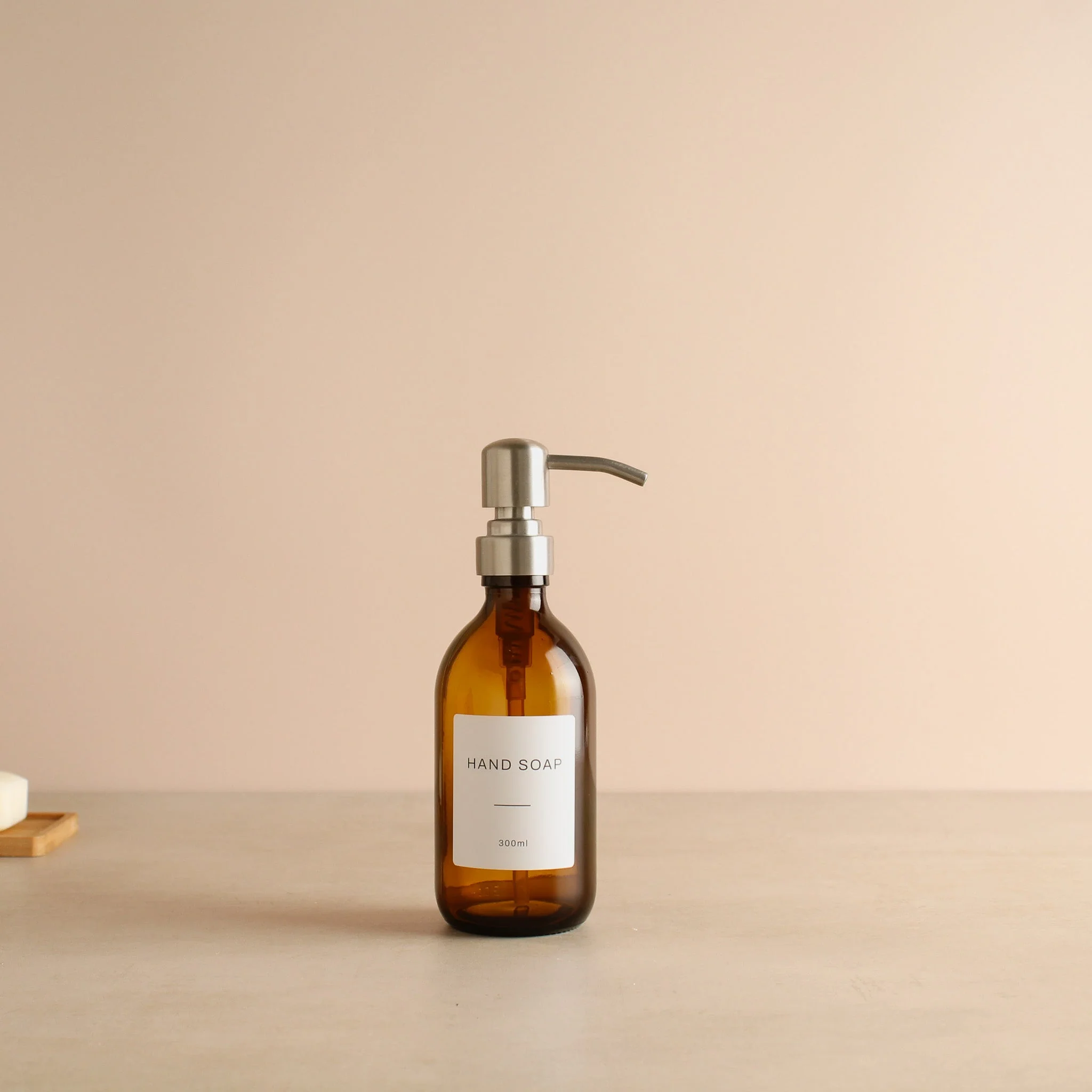 Labelled Amber Glass Dispenser Bottle With Silver Pump - Image 6