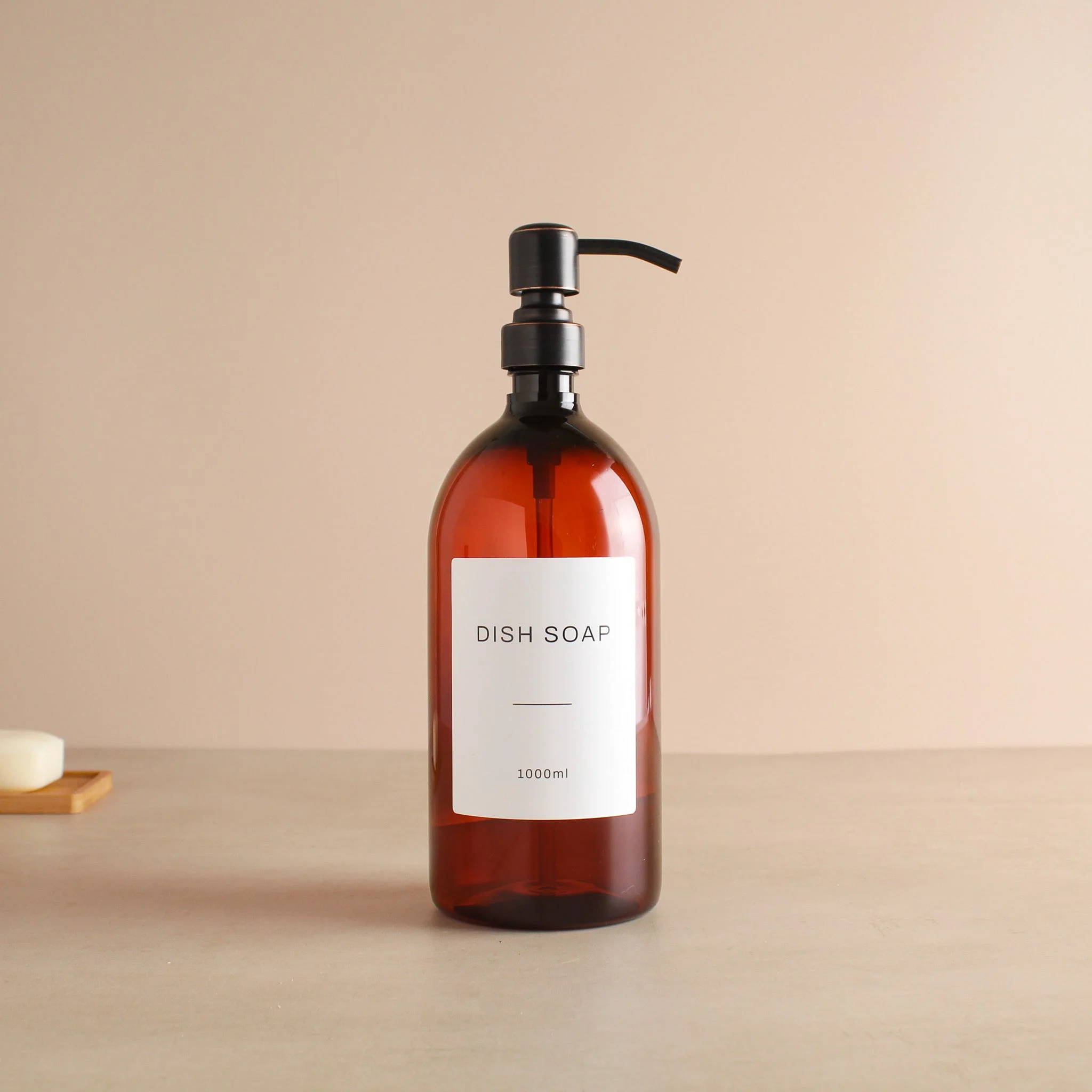 Labelled Amber Plastic Dispenser Bottle With Black/Copper Pump - Image 3