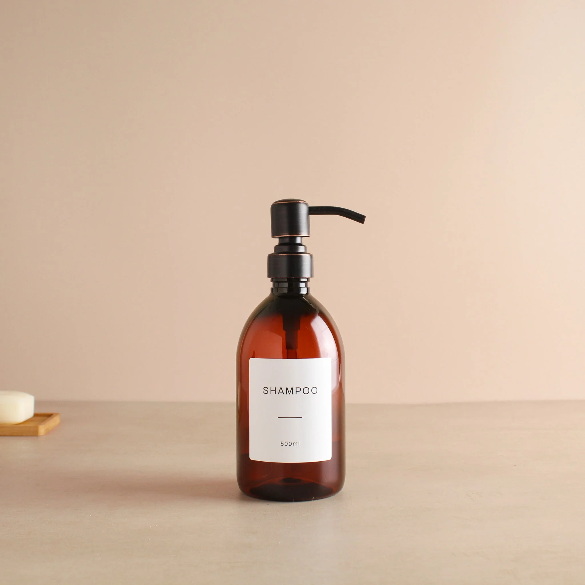 Labelled Amber Plastic Dispenser Bottle With Black/Copper Pump - Image 4
