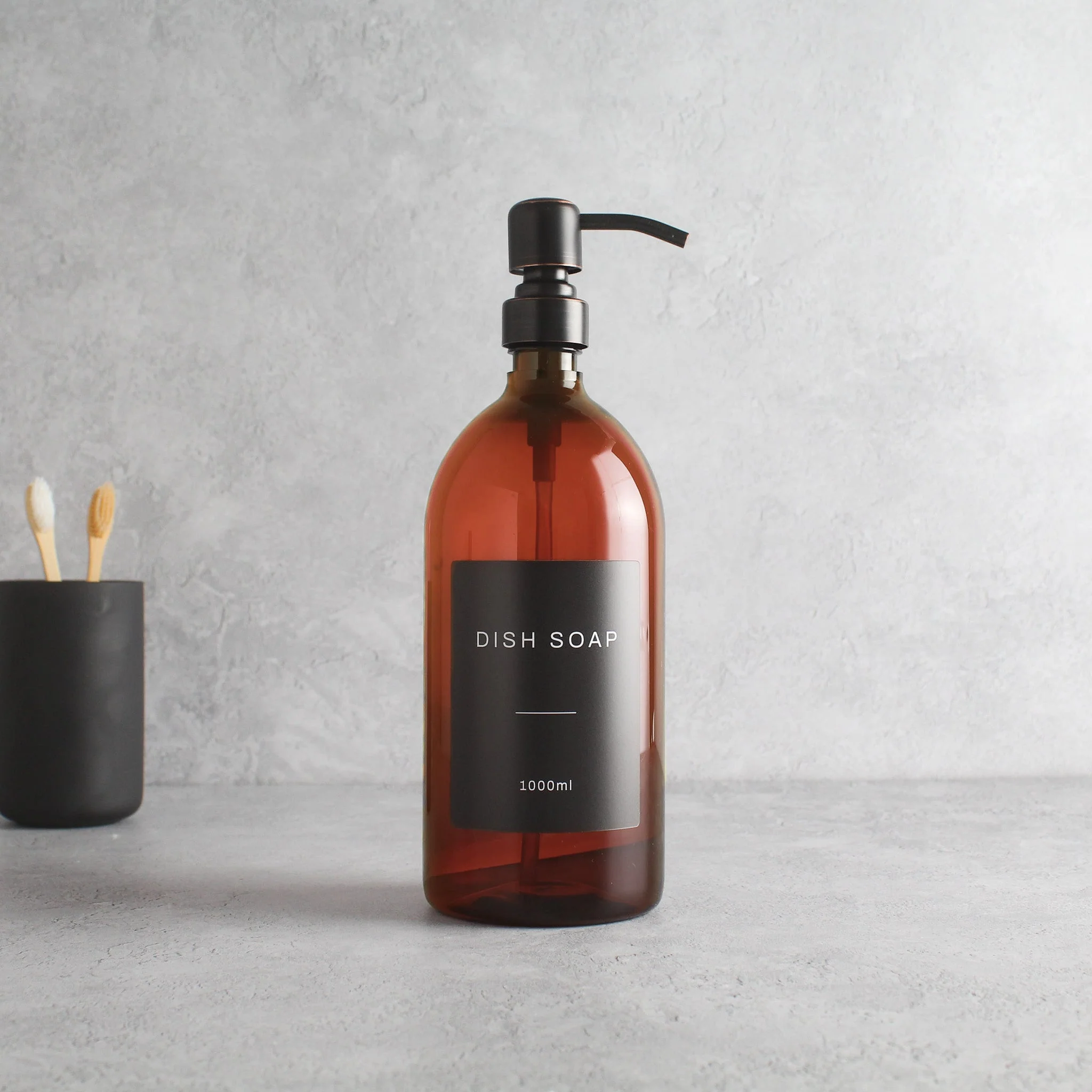 Labelled Amber Plastic Dispenser Bottle With Black/Copper Pump - Image 3