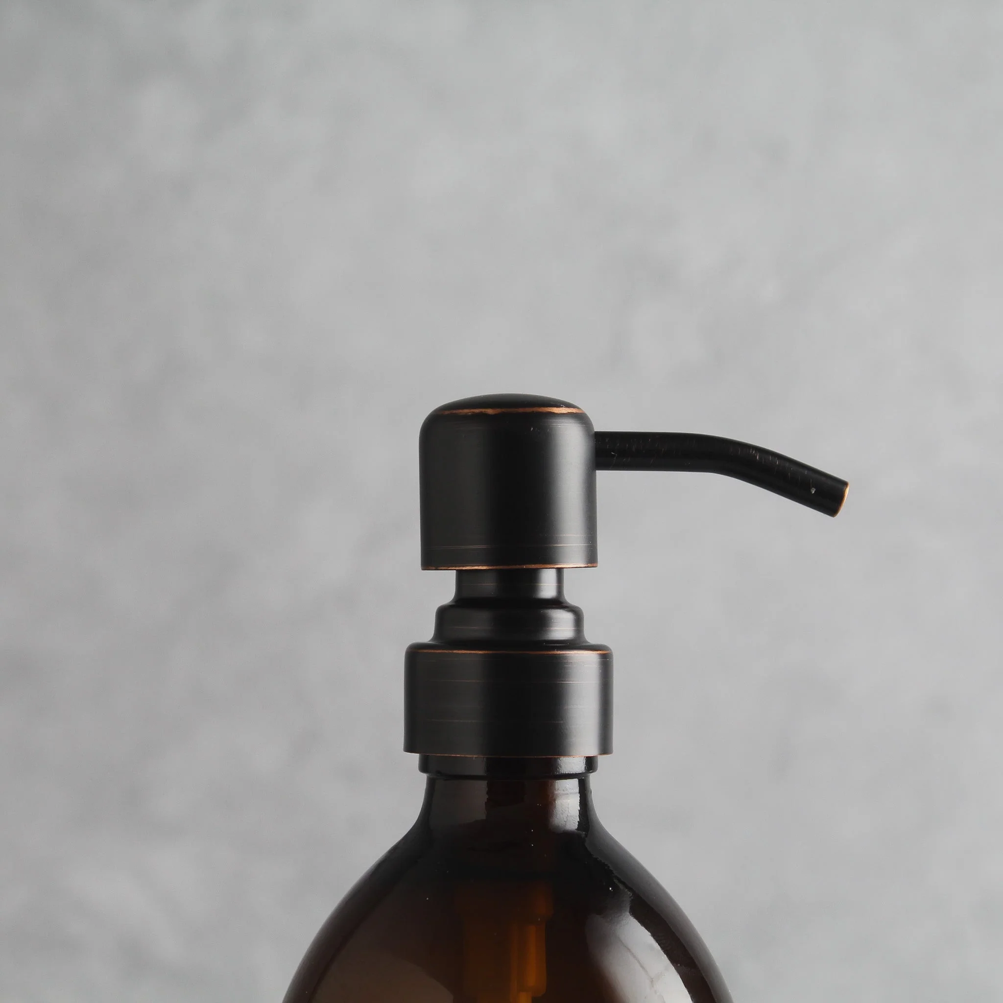 Labelled Amber Plastic Dispenser Bottle With Black/Copper Pump - Image 6