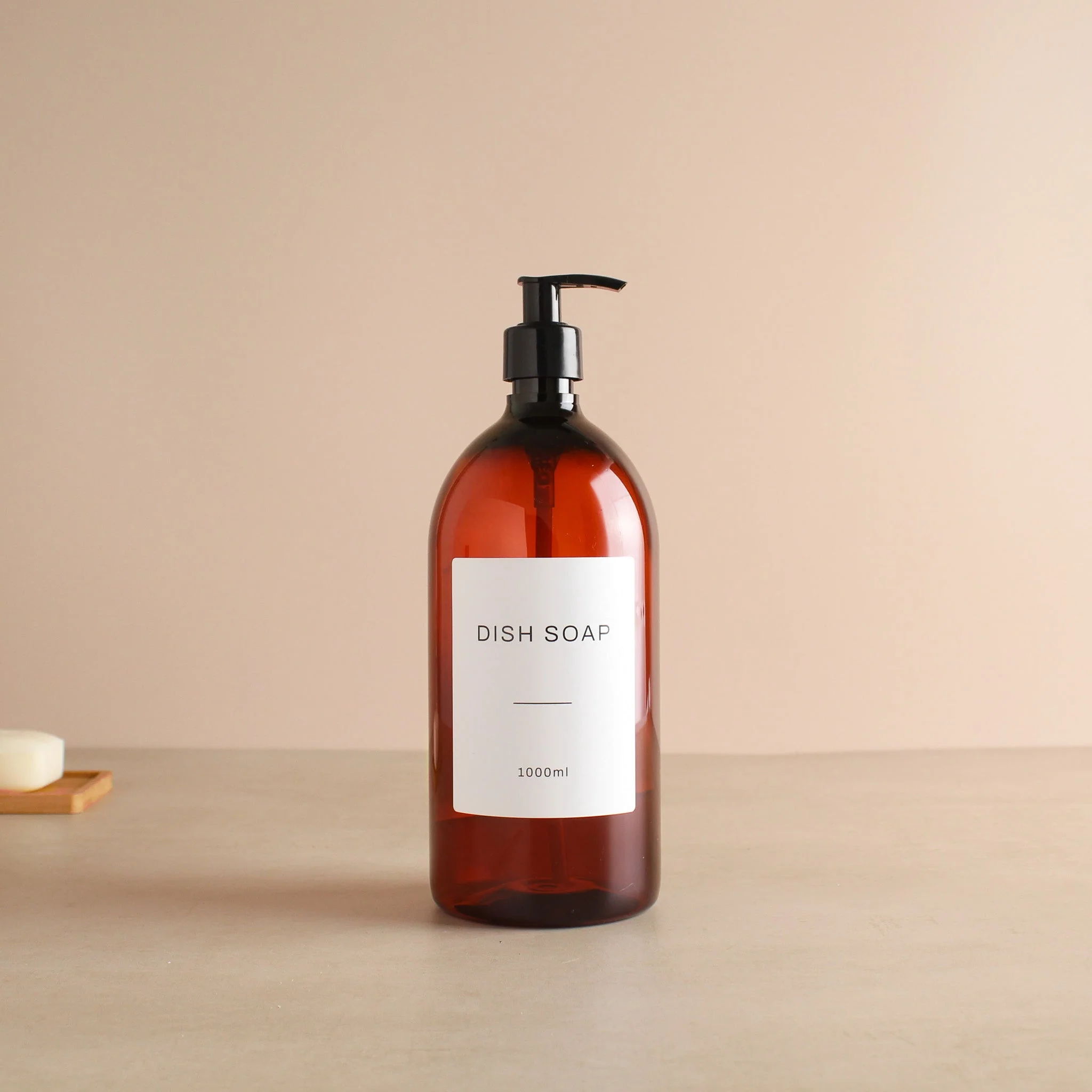 Labelled Amber Plastic Dispenser Bottle With Black Pump - Image 3