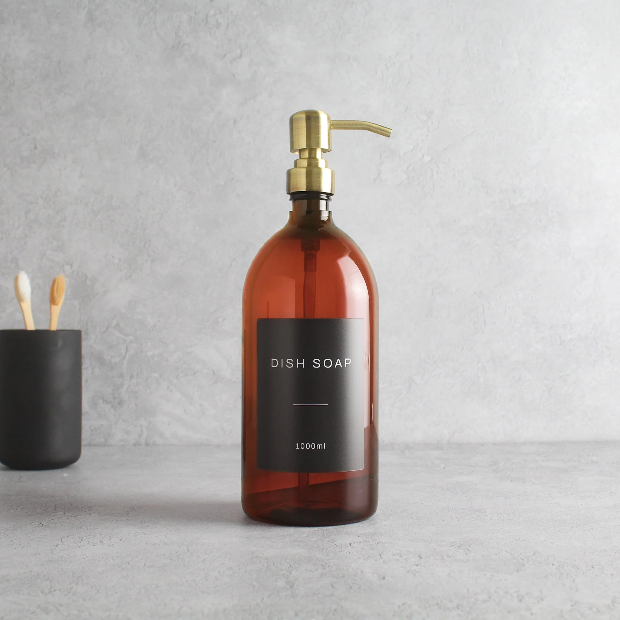 Labelled Amber Plastic Dispenser Bottle With Gold Pump - Image 3