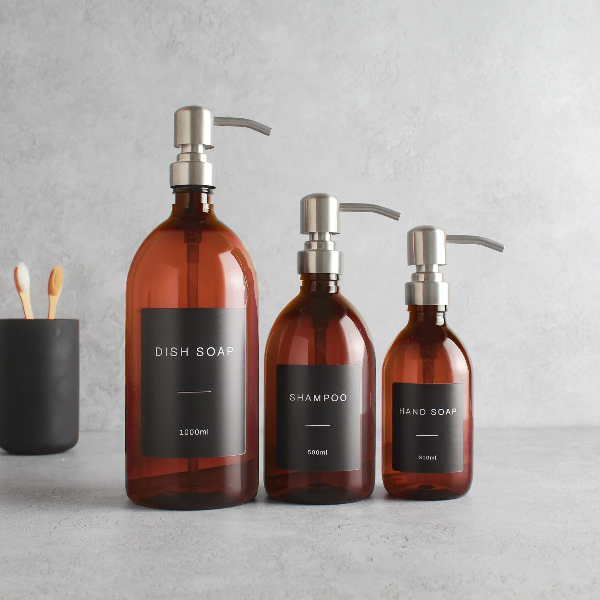 Labelled Amber Plastic Dispenser Bottle With Silver Pump - Image 2