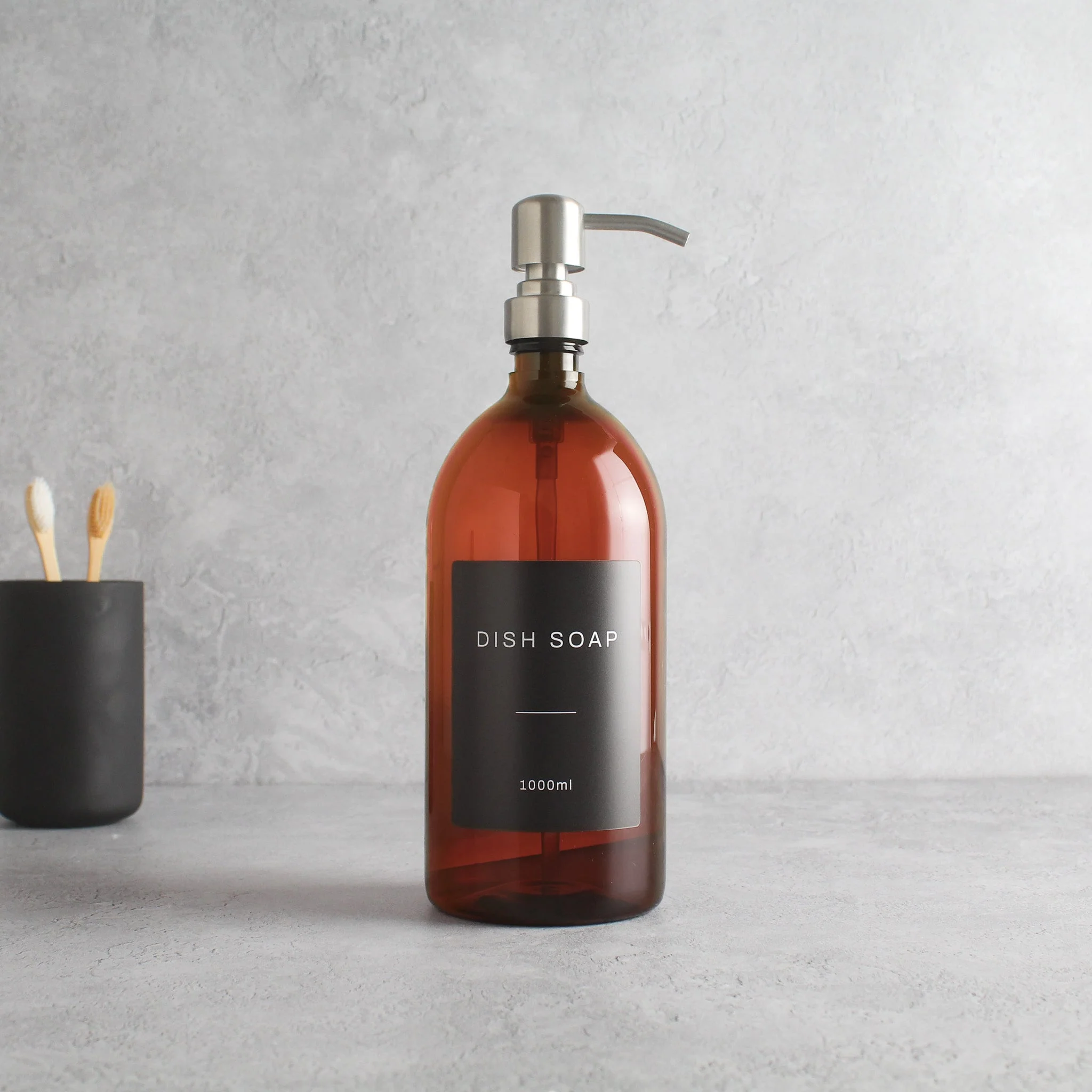 Labelled Amber Plastic Dispenser Bottle With Silver Pump - Image 3