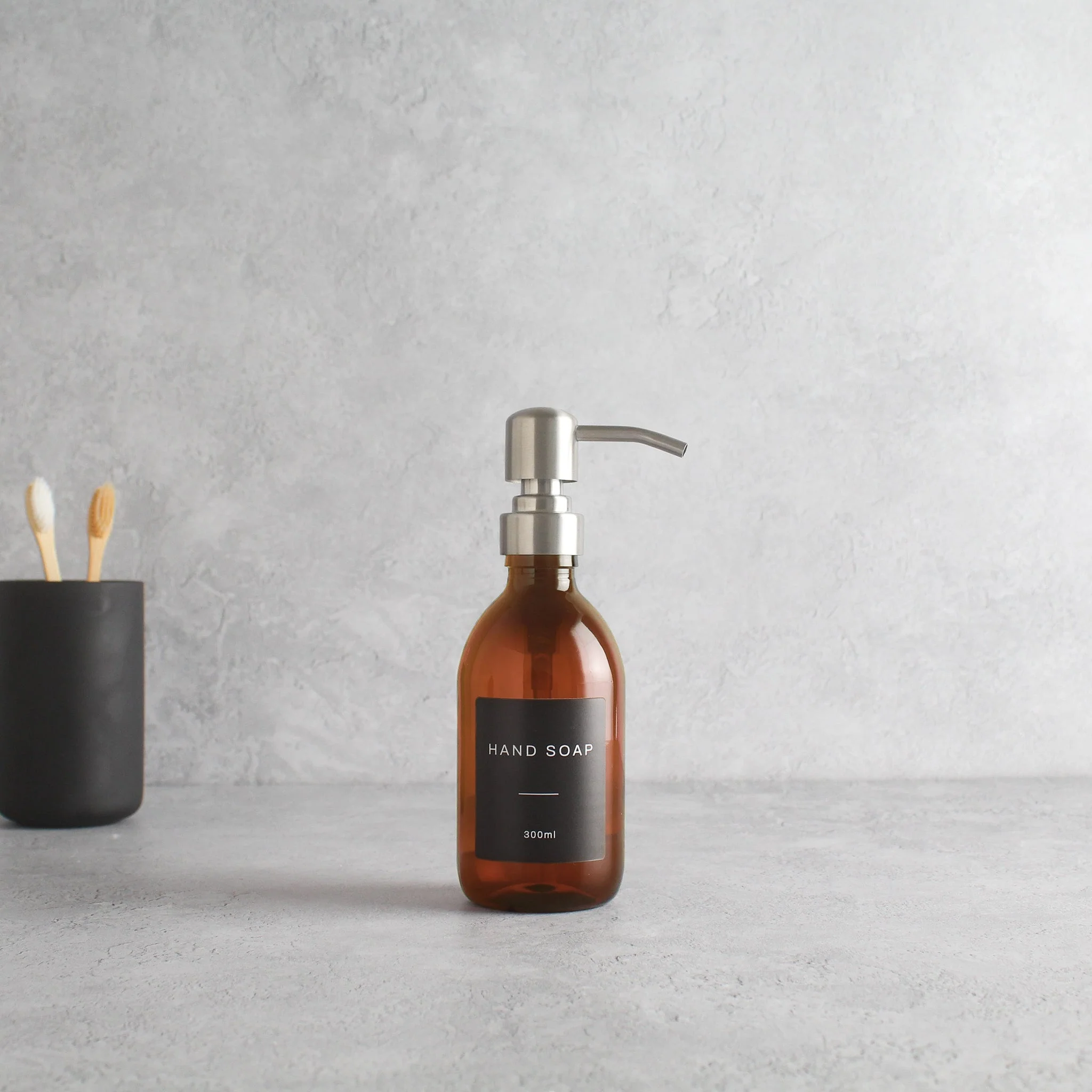 Labelled Amber Plastic Dispenser Bottle With Silver Pump - Image 5