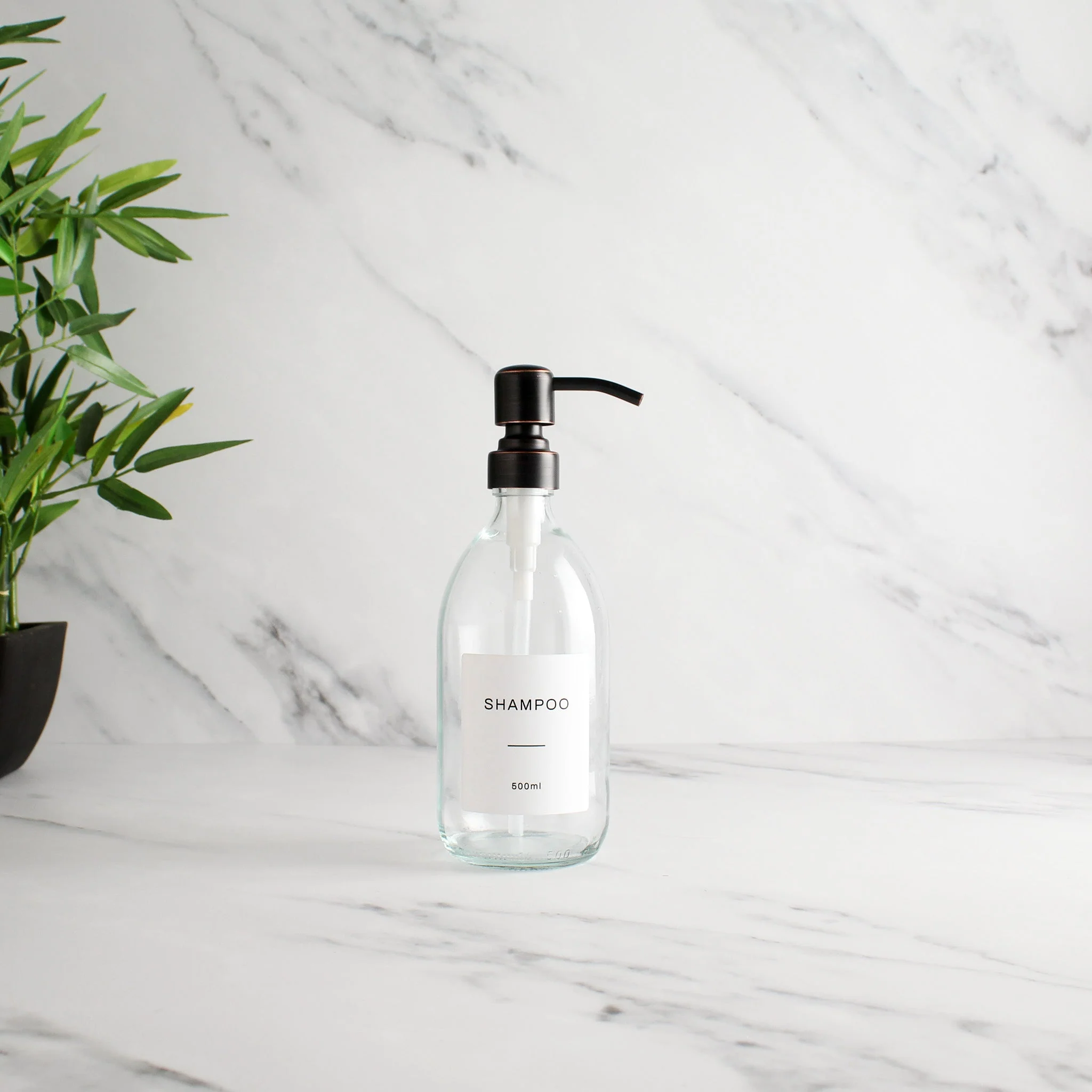 Labelled Clear Glass Dispenser Bottle With Black/Copper Pump - Image 4