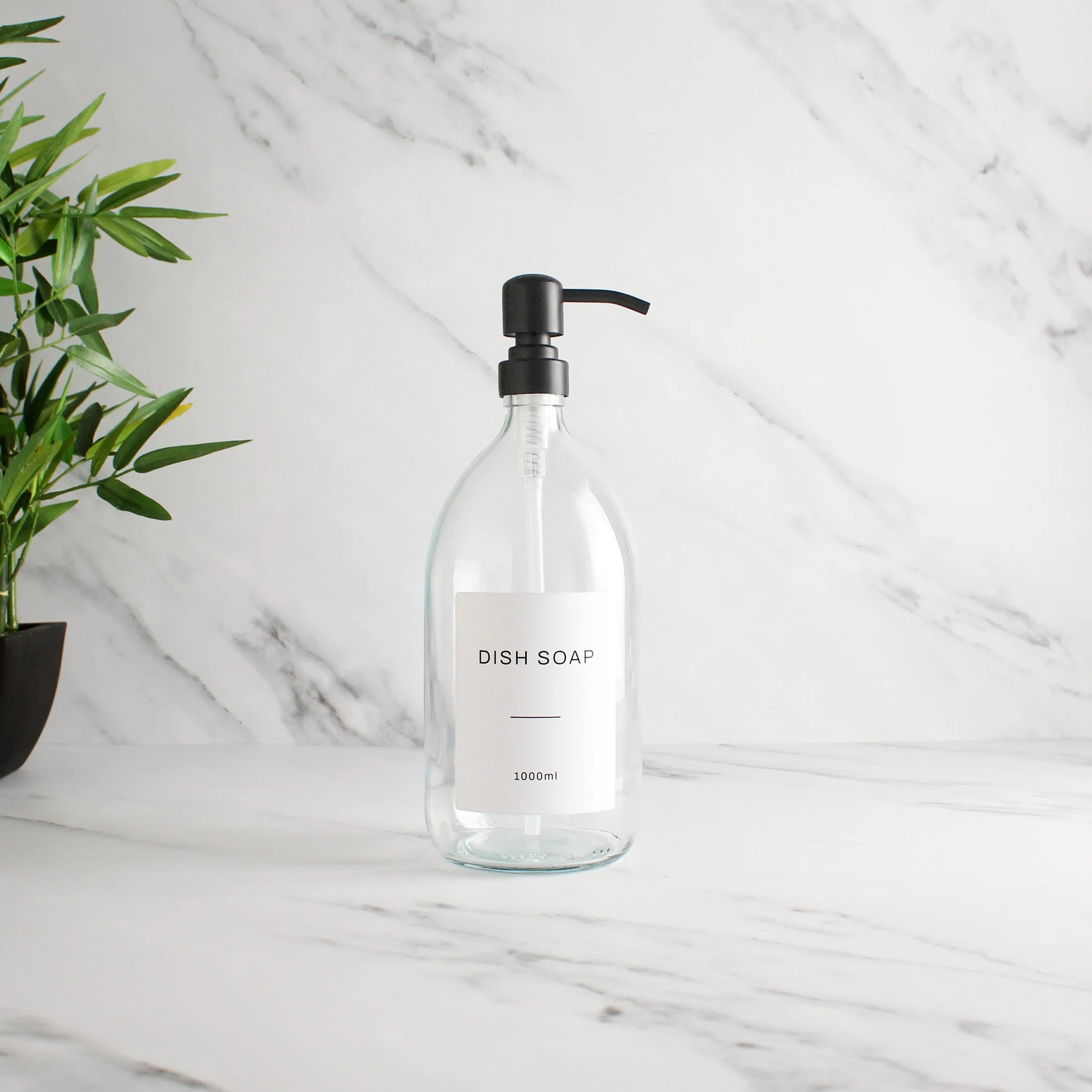 Labelled Clear Glass Dispenser Bottle With Matte Black Pump - Image 3