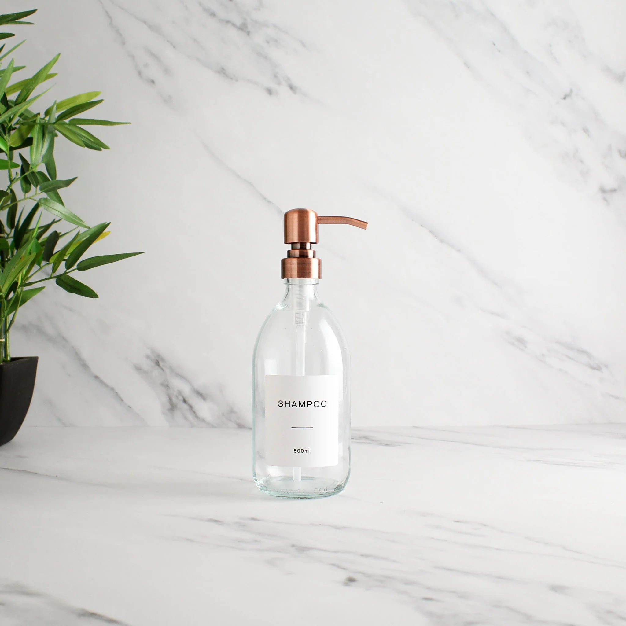 Labelled Clear Glass Dispenser Bottle With Rose Gold Pump - Image 4