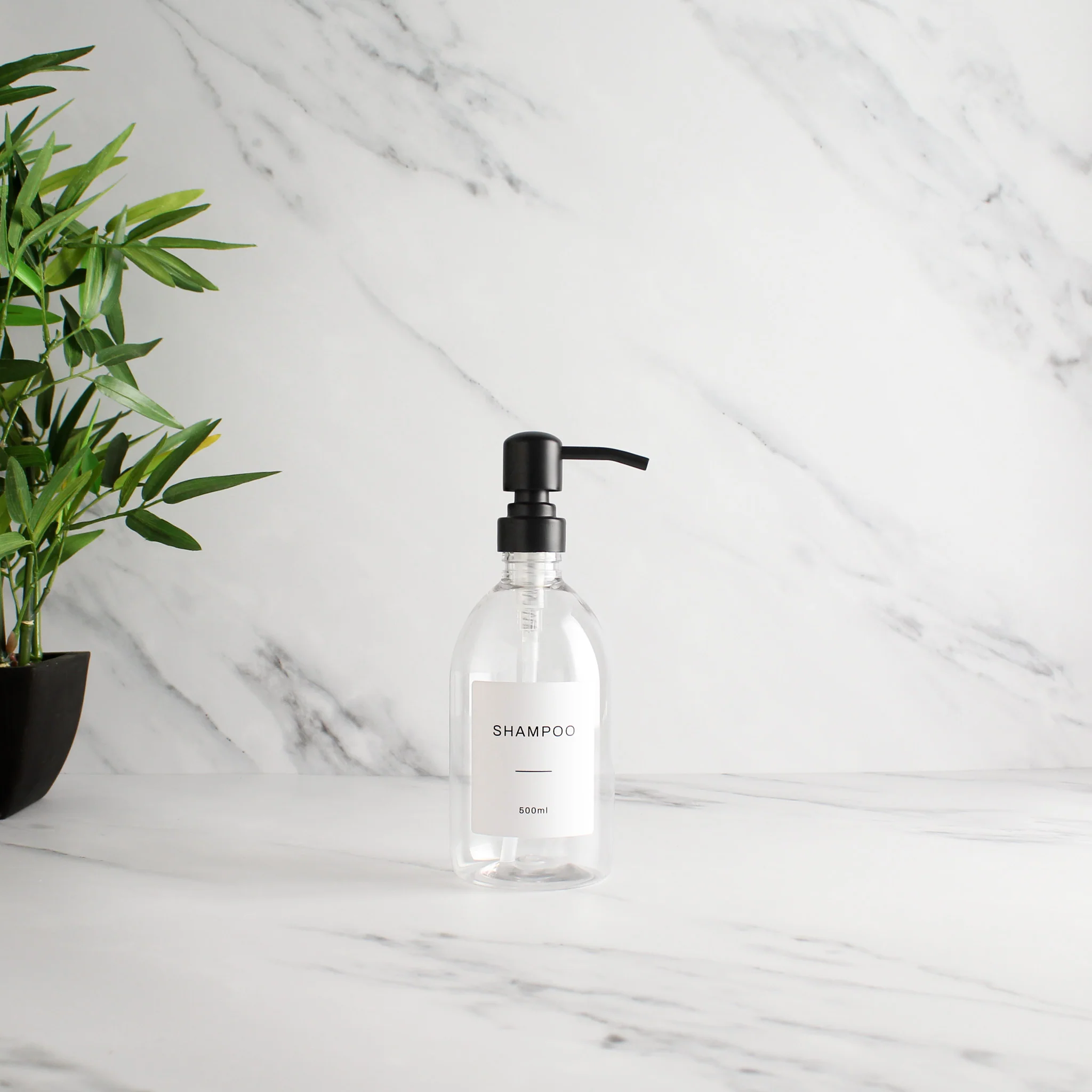 Labelled Clear Plastic Dispenser Bottle With Matte Black Pump - Image 3