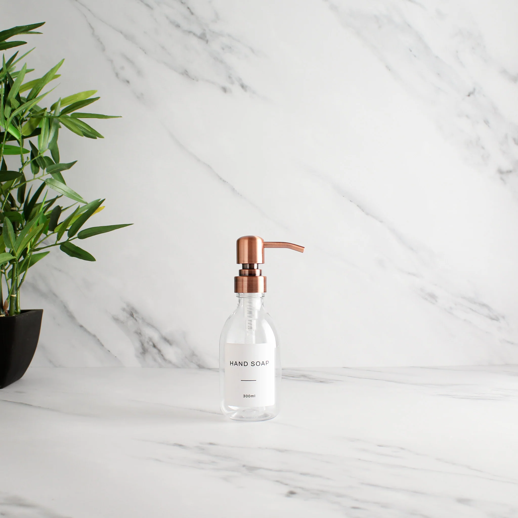 Labelled Clear Plastic Dispenser Bottle With Rose Gold Pump - Image 4